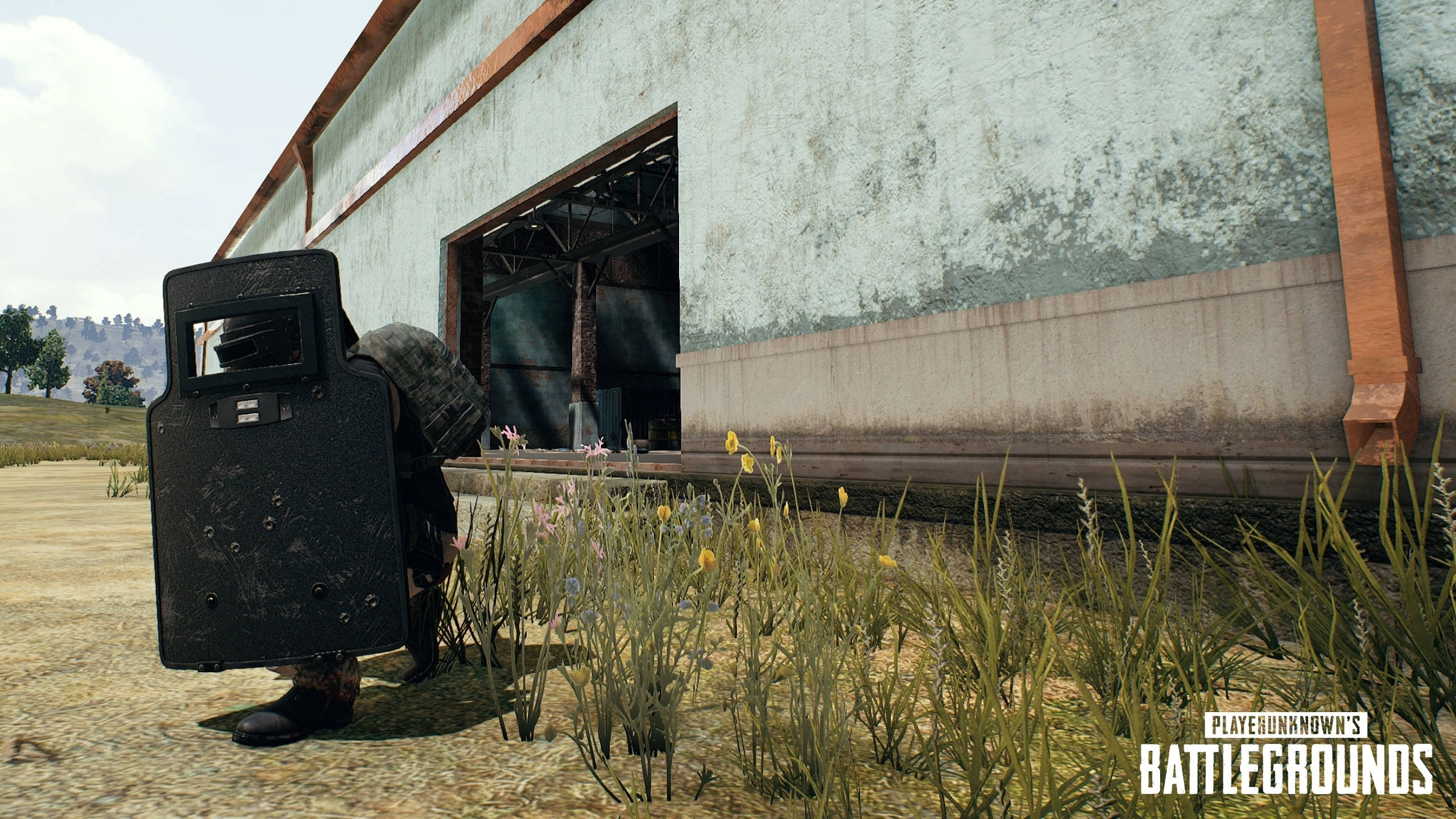 PUBG, tactical shield, weathered warehouse, 2K Desktop Wallpaper