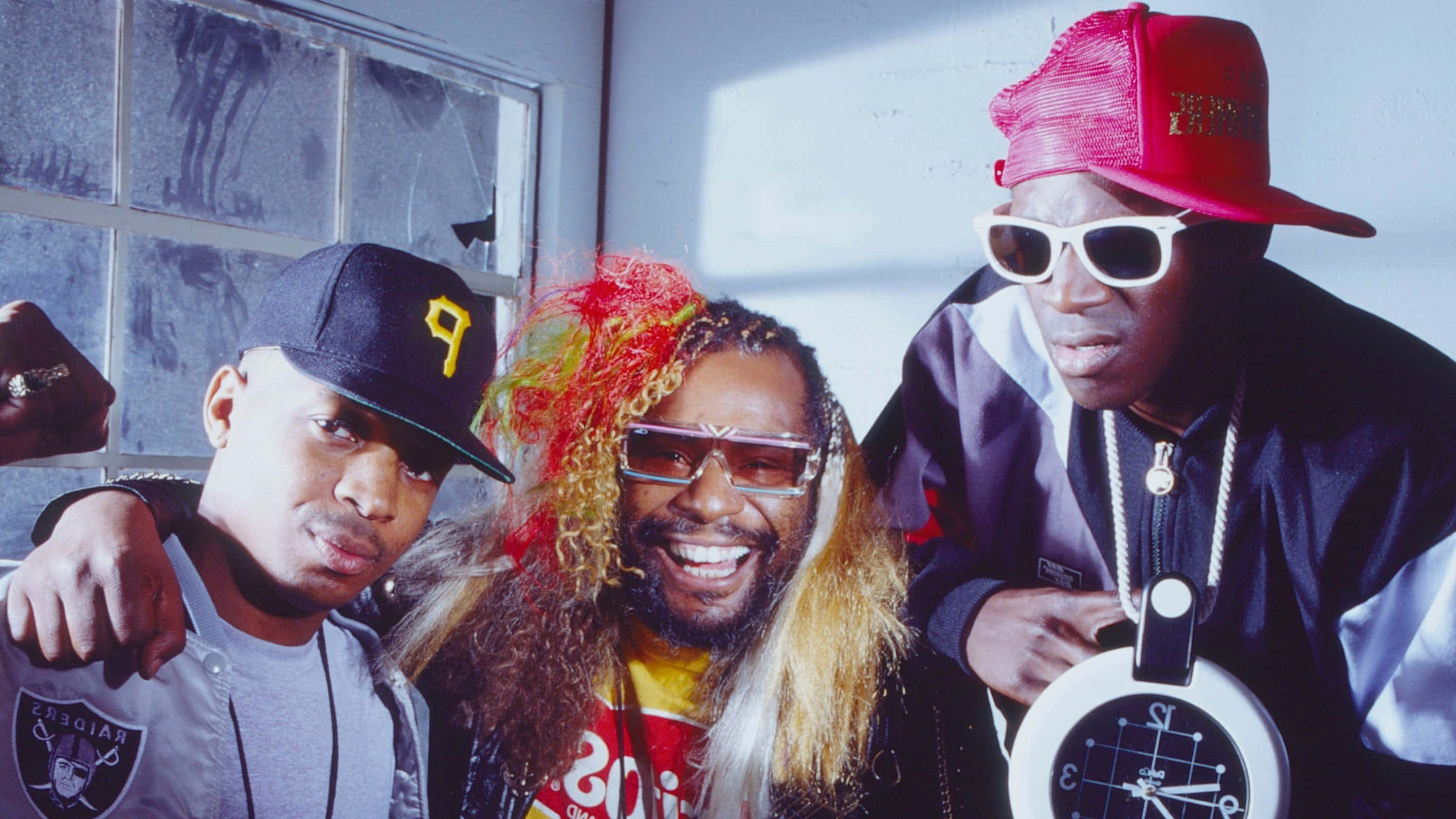 Public Enemy, 90s hip hop attire, bold colors, 2K Desktop Wallpaper