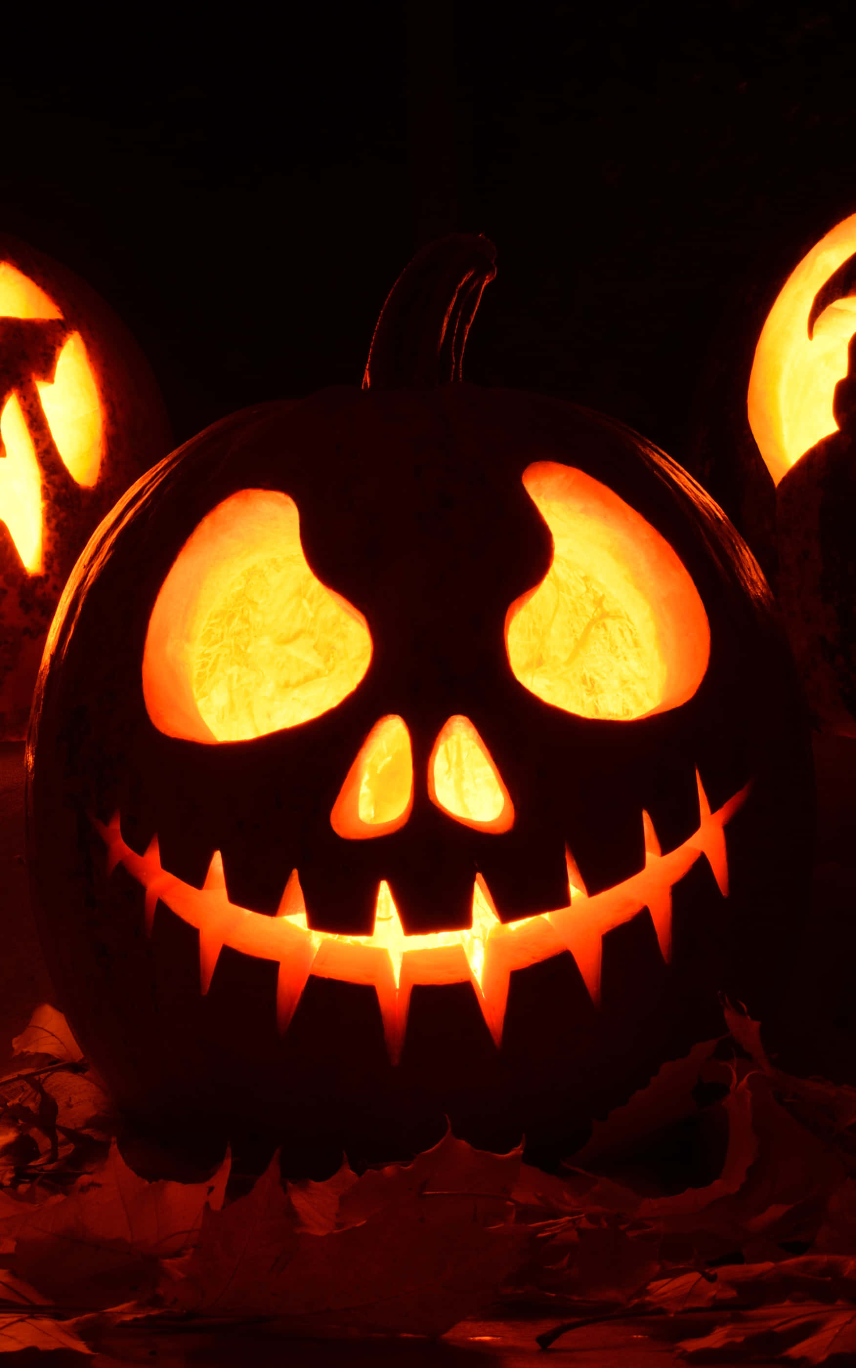 glowing jack o lantern, wide toothy grin, hollow eyes, 2K Phone Wallpaper
