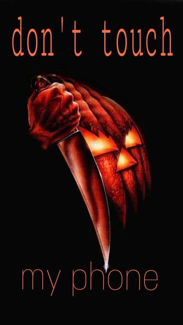 jack-o'-lantern, glowing, knife, SD Phone Wallpaper