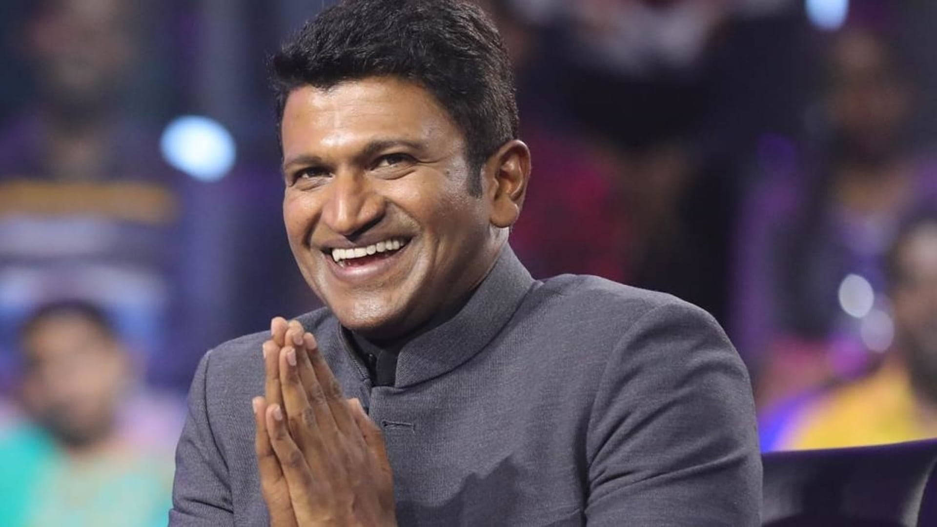 Puneeth Rajkumar, grey kurta, smiles broadly, Full HD Desktop Wallpaper