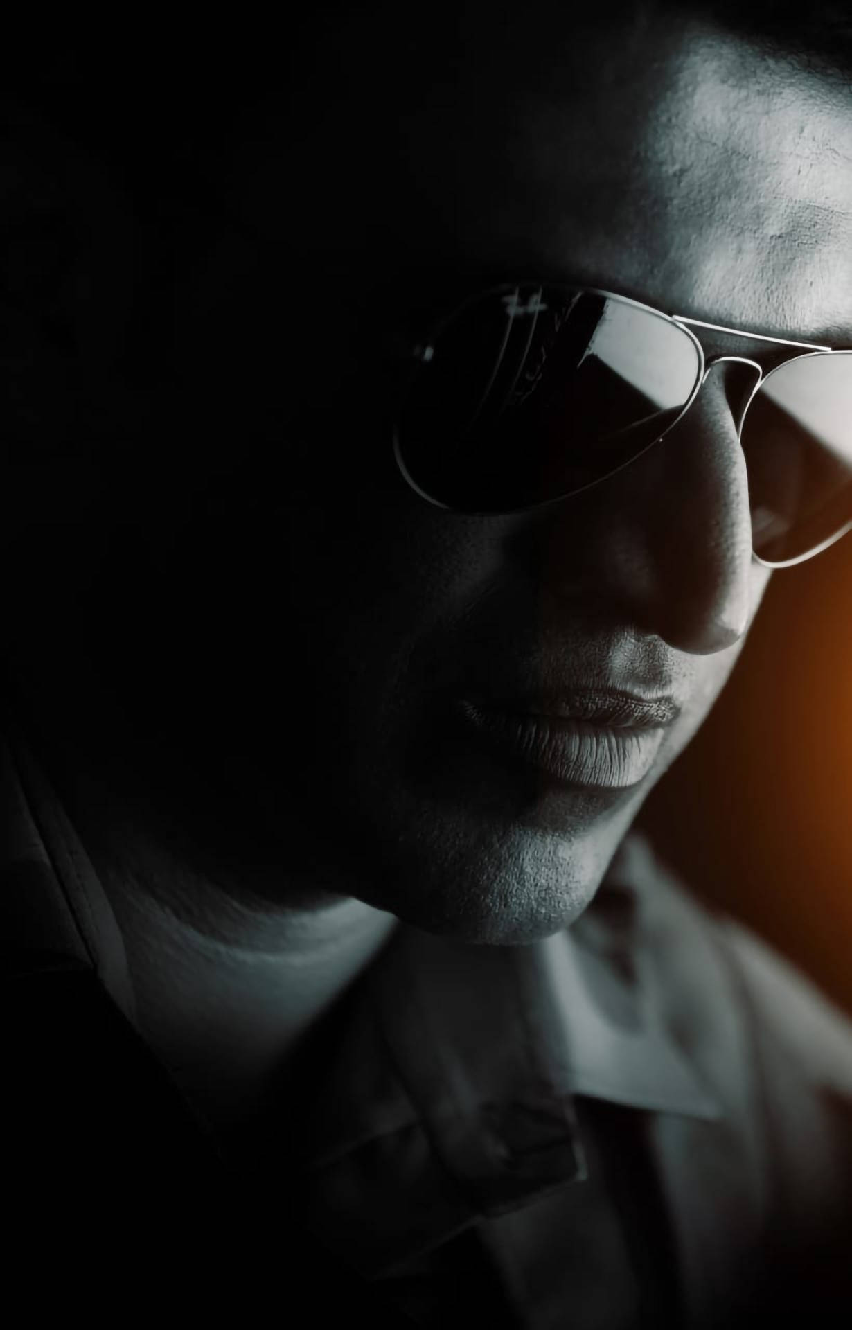Puneeth Rajkumar, aviator sunglasses, dramatic lighting, Full HD Phone Wallpaper