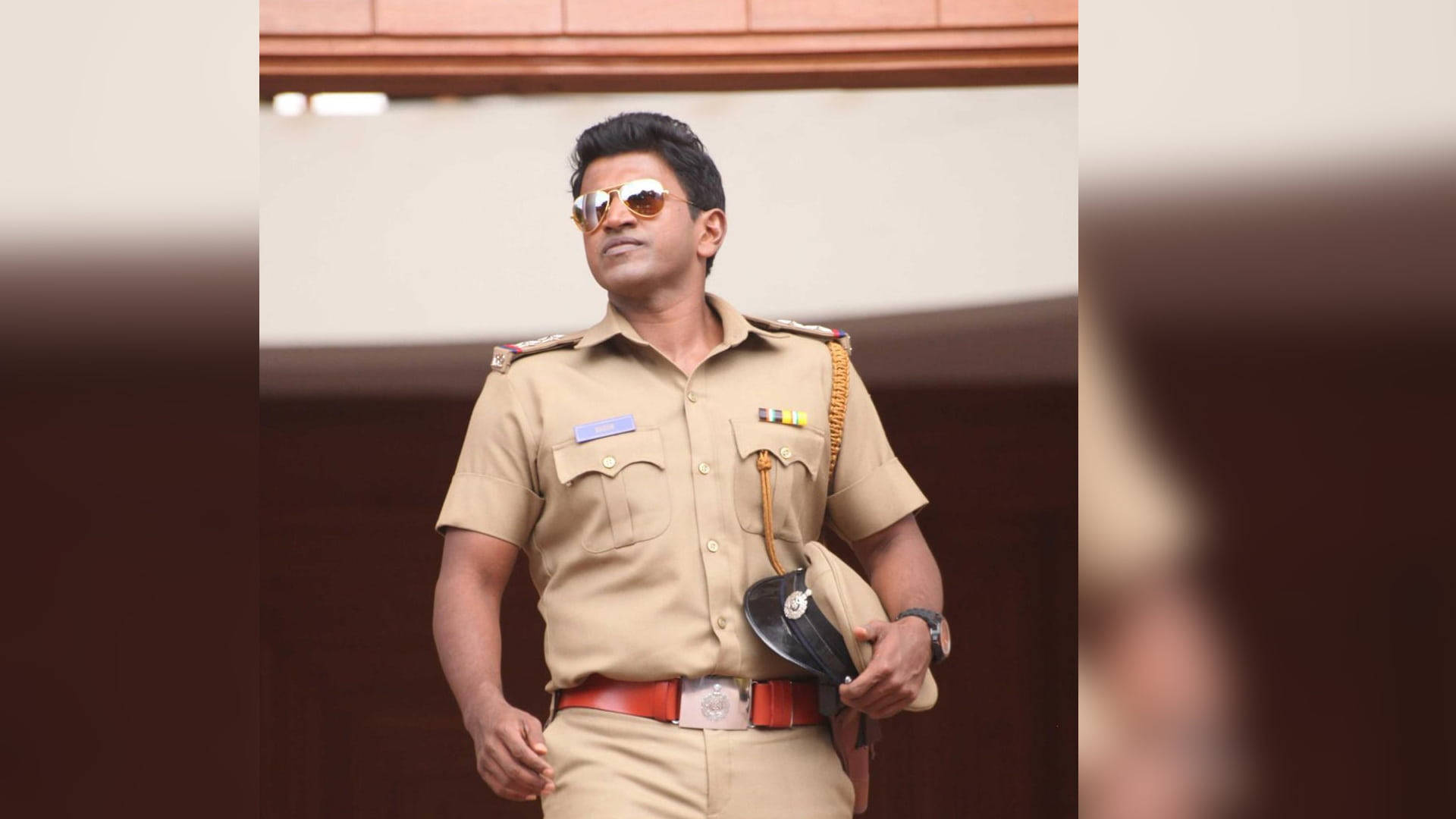 Puneeth Rajkumar, khaki uniform, sunglasses, Full HD Desktop Wallpaper