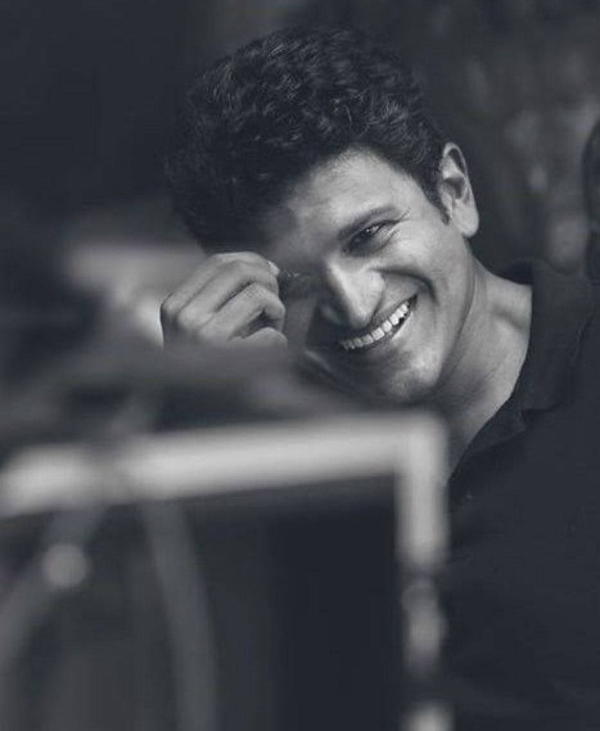 Puneeth Rajkumar, curly hair, laughs heartily, HD Phone Wallpaper