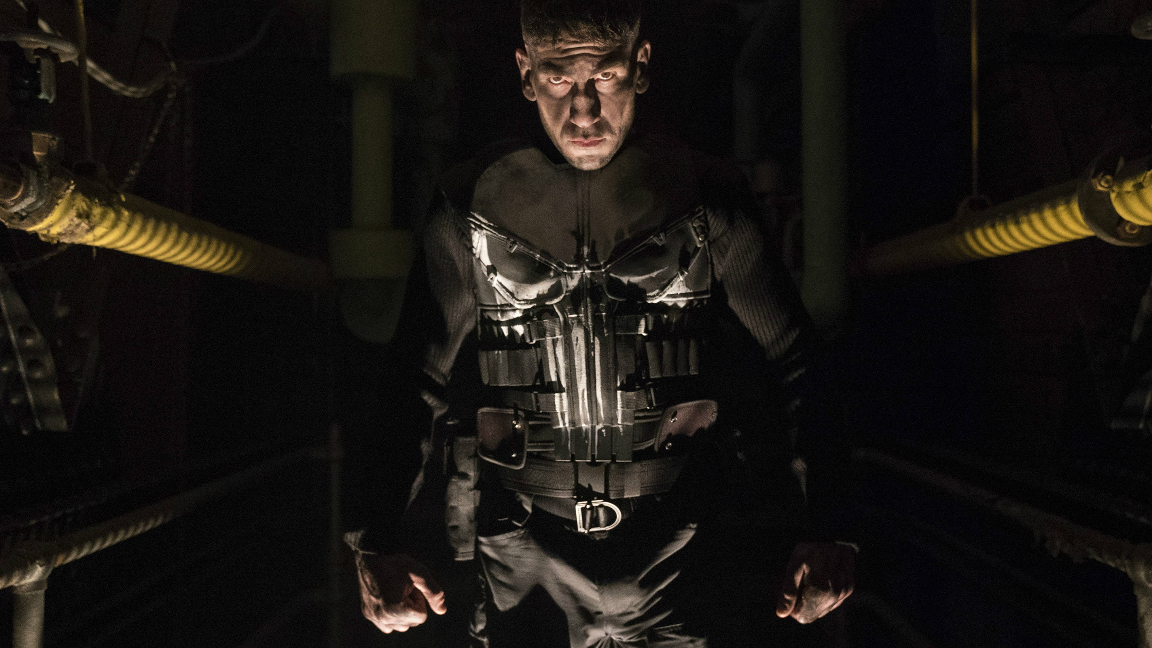 The Punisher, black aesthetic, dimly lit industrial corridor, 4K Desktop Wallpaper