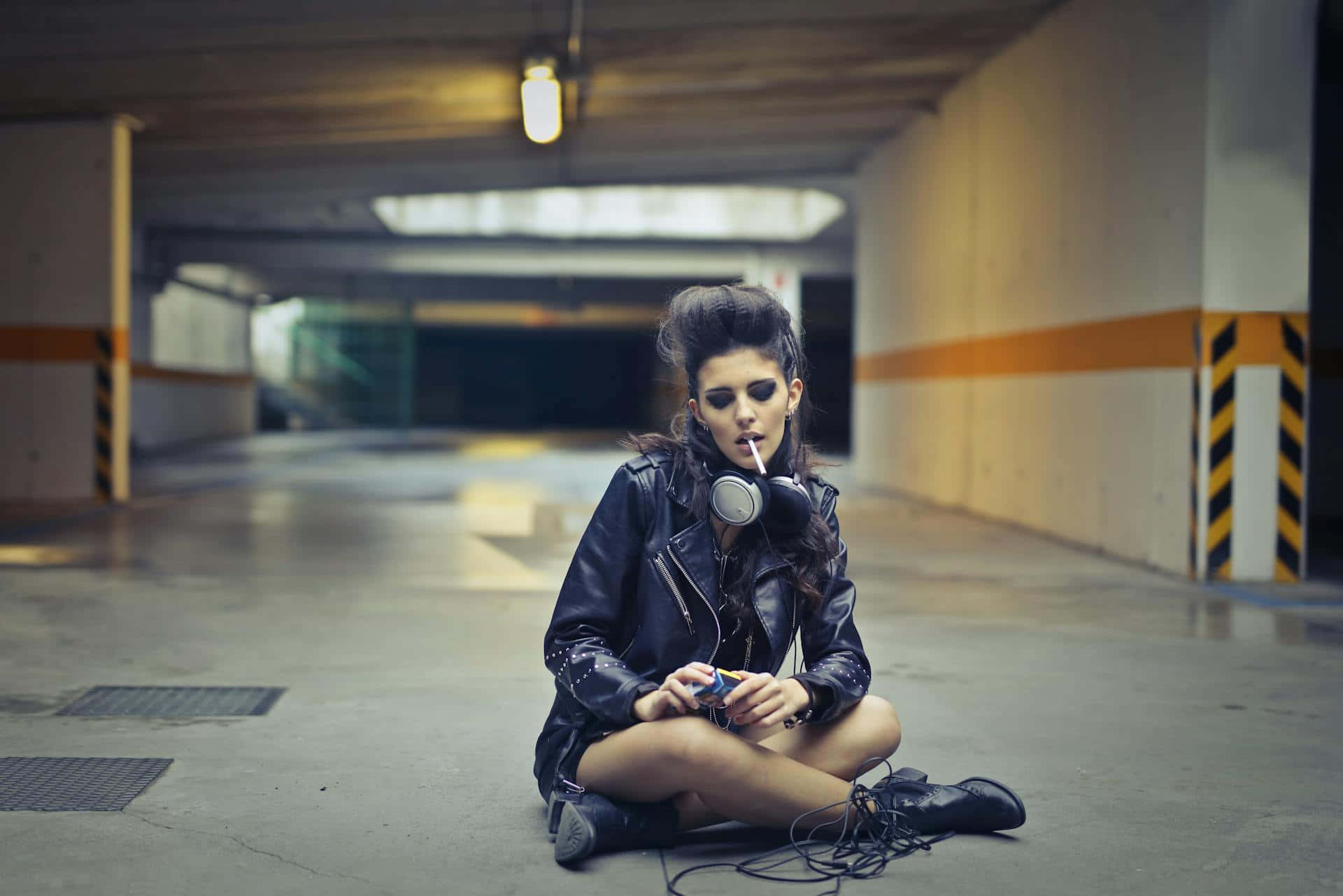 black leather jacket, concrete floor, dimly lit underground parking garage, Full HD Desktop Wallpaper