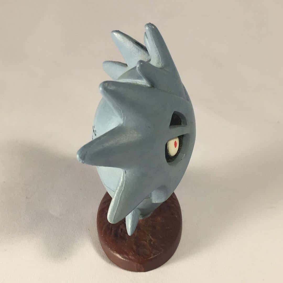 Pupitar, gray spiky, one visible eye, SD Desktop Wallpaper