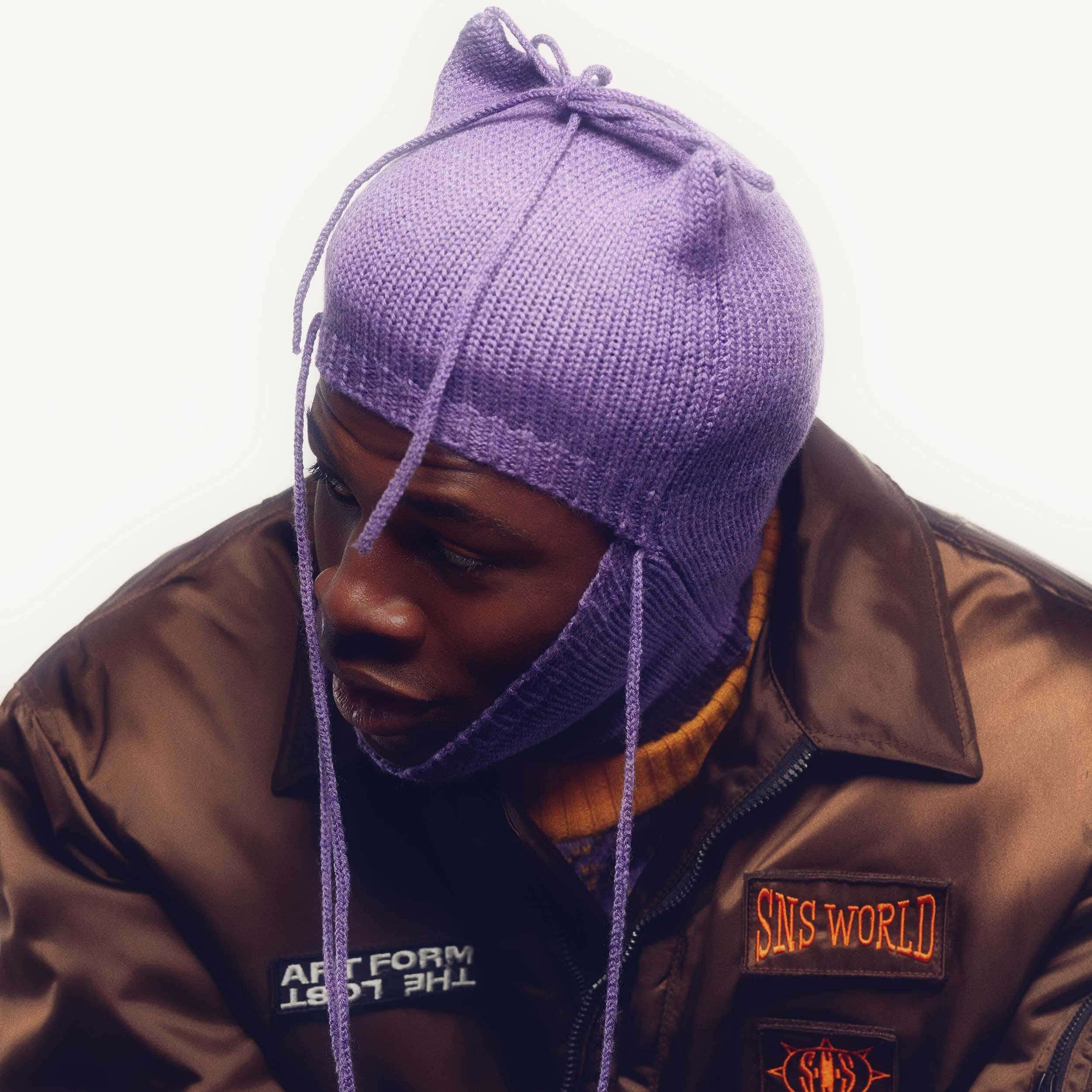 purple knit beanie, brown jacket, contemplative expression, Full HD Desktop Wallpaper