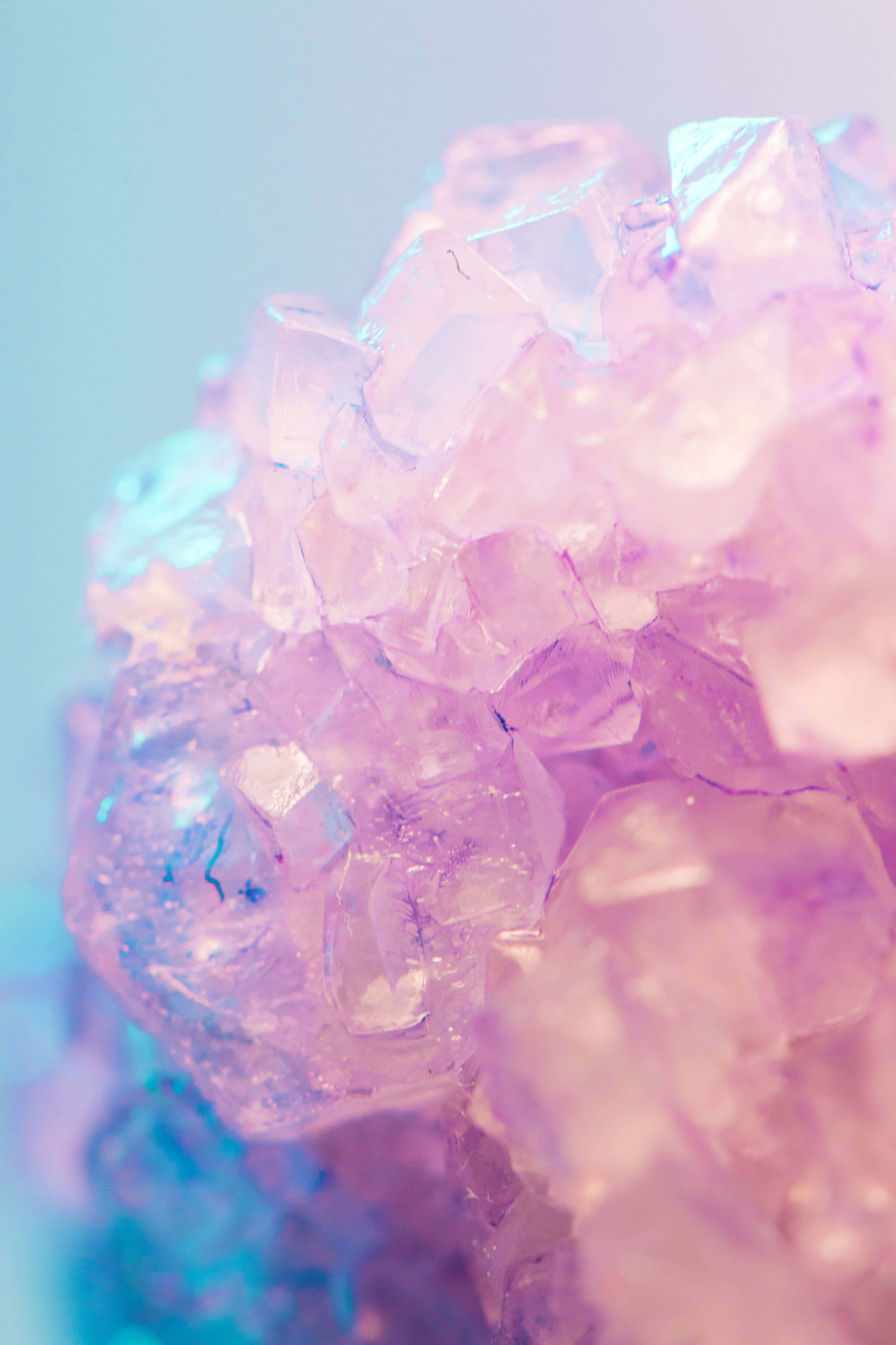purple and blue hues, sparkling pink and blue crystal clusters, soft glowing highlights, 5K Phone Wallpaper