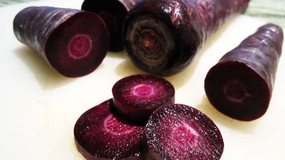 purple carrots, magenta cores, pale cutting board, SD Desktop Wallpaper