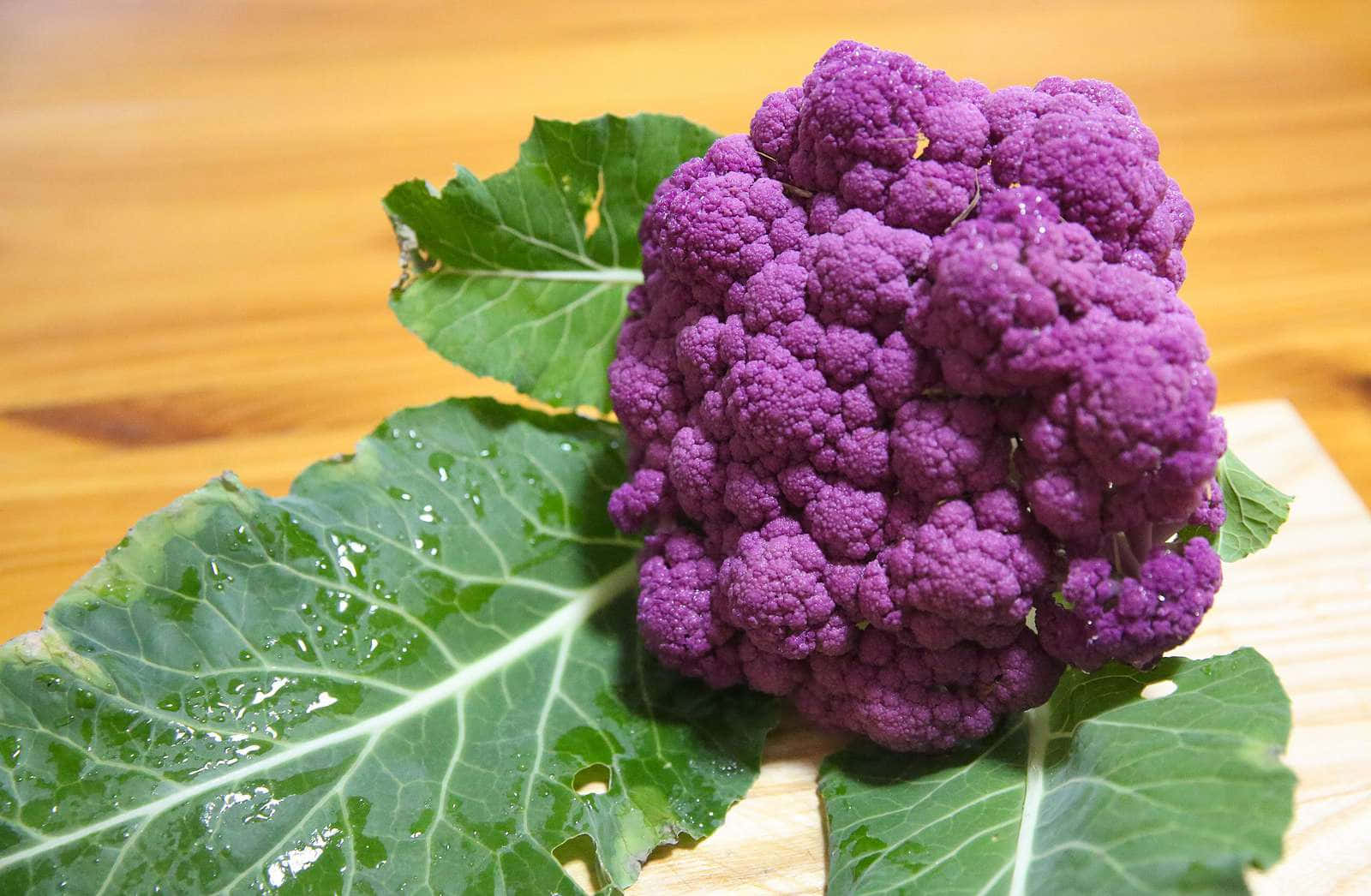 Purple Cauliflower, vibrant purple cauliflower, fresh green leaves, HD Desktop Wallpaper