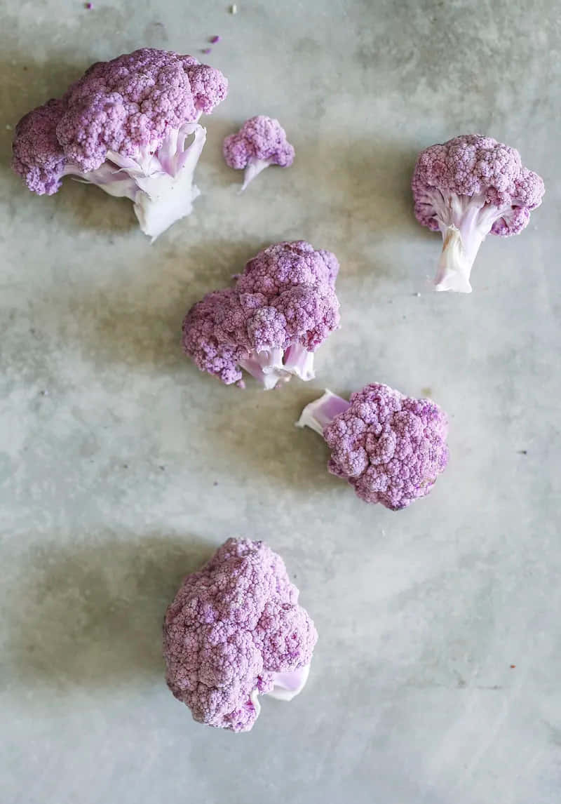 Purple Cauliflower, light gray textured surface, soft natural light, SD Phone Wallpaper