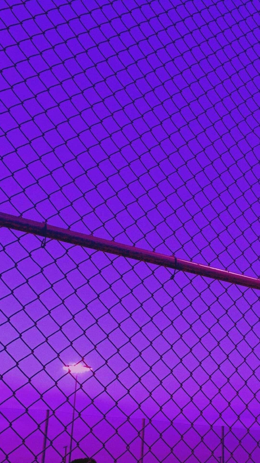 chain-link fence, vibrant purple twilight sky, distant streetlight, Full HD Phone Wallpaper