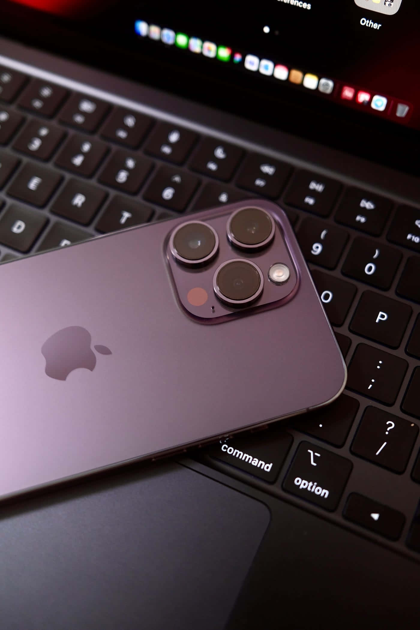 iPhone 14 Pro Max, purple, black laptop keyboard, Full HD Phone Wallpaper