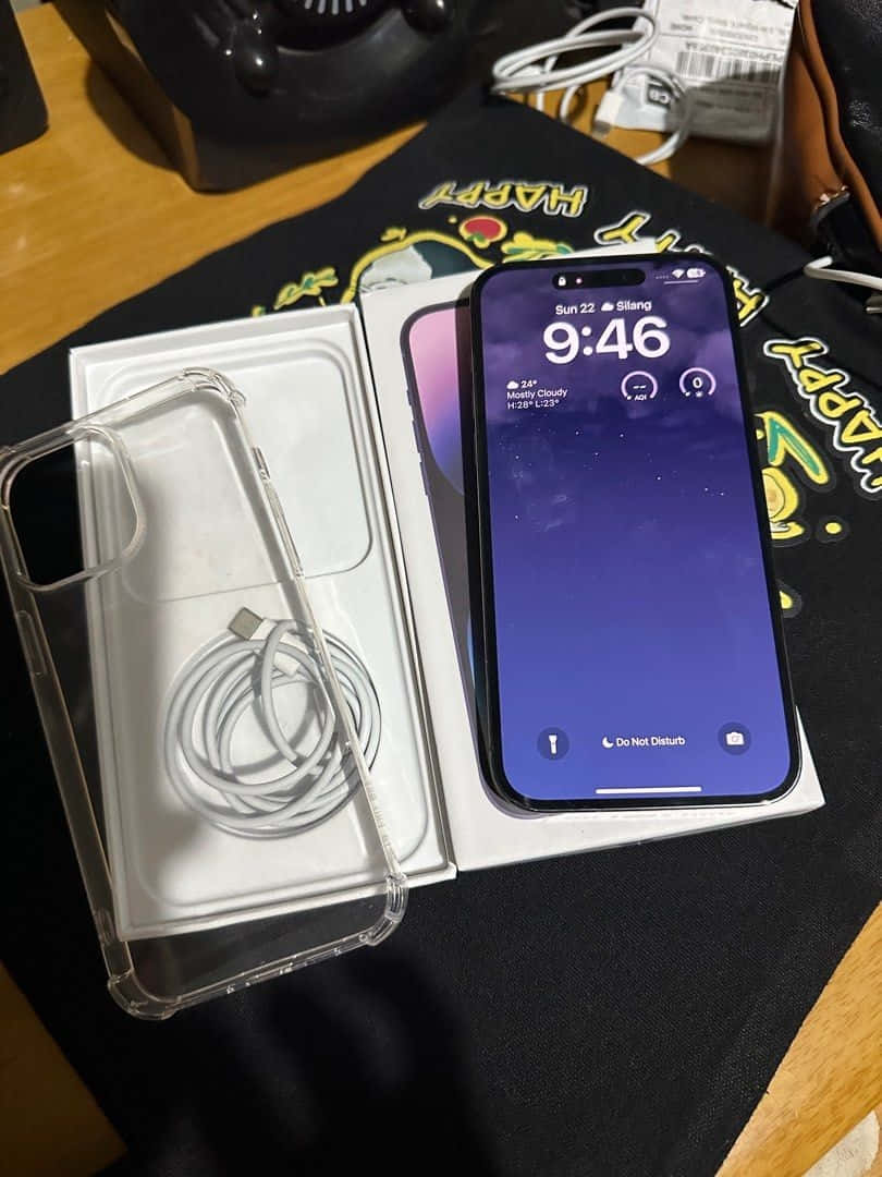 Purple iPhone 14 Pro Max, clear case, cable, SD Phone Wallpaper
