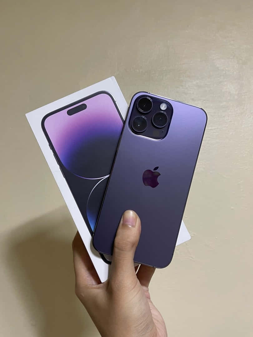 purple iPhone 14 Pro, box, beige wall, SD Phone Wallpaper