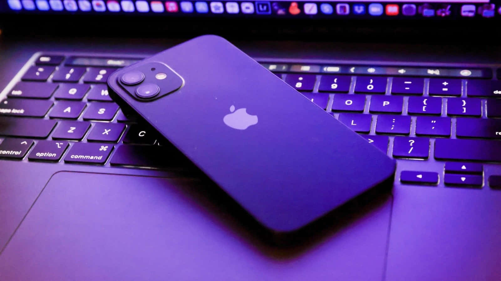 Purple iPhone 12, laptop keyboard, vibrant purple backlight glow, HD Desktop Wallpaper