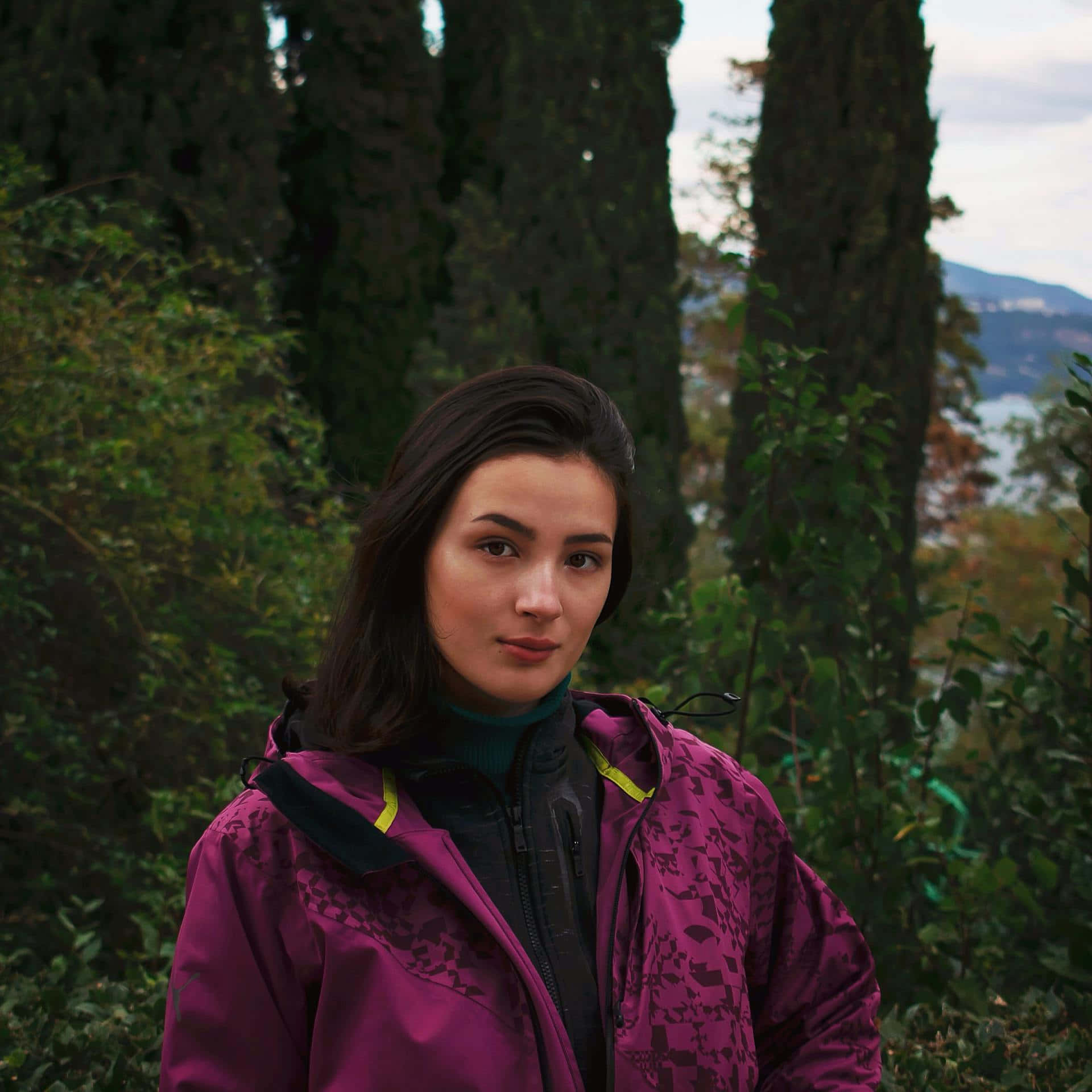 woman, vibrant purple jacket, tall cypress trees, Full HD Desktop Wallpaper