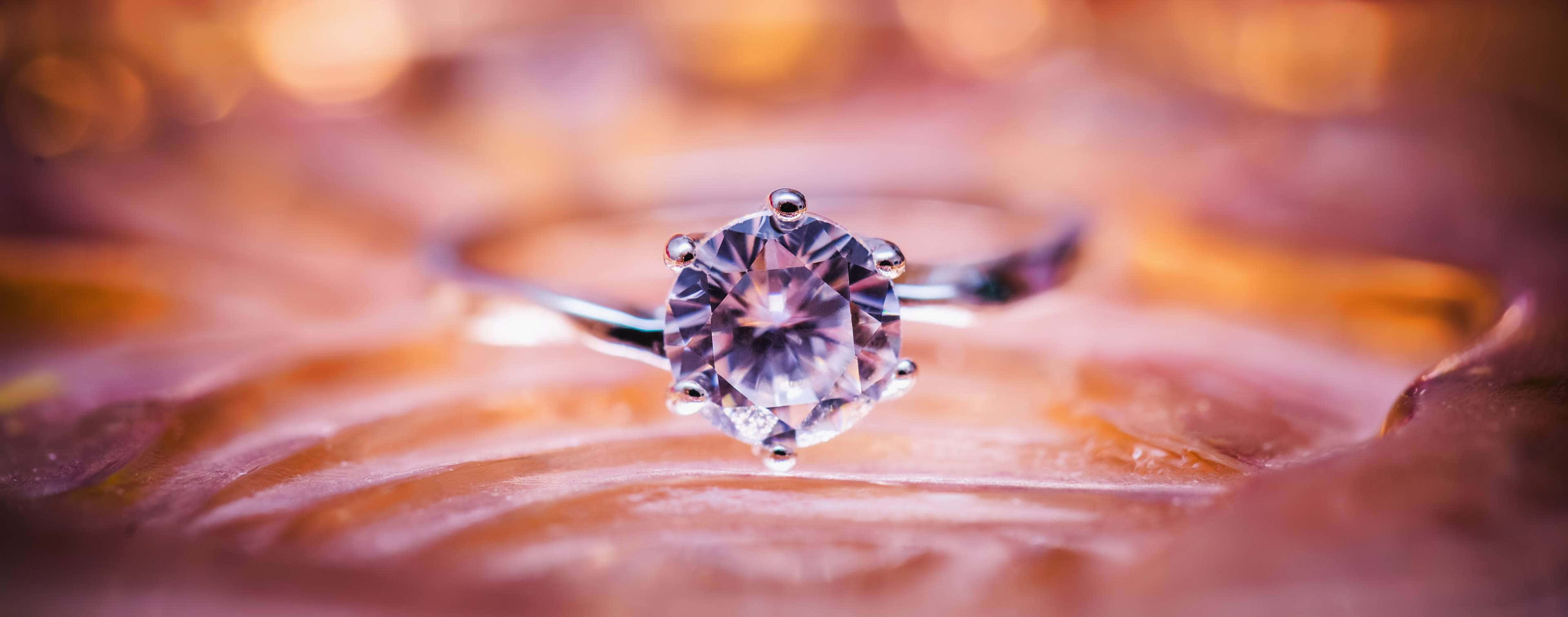 Elegant Purple Jewelry Set, sparkling diamond engagement ring, soft golden light, 4K Desktop Wallpaper