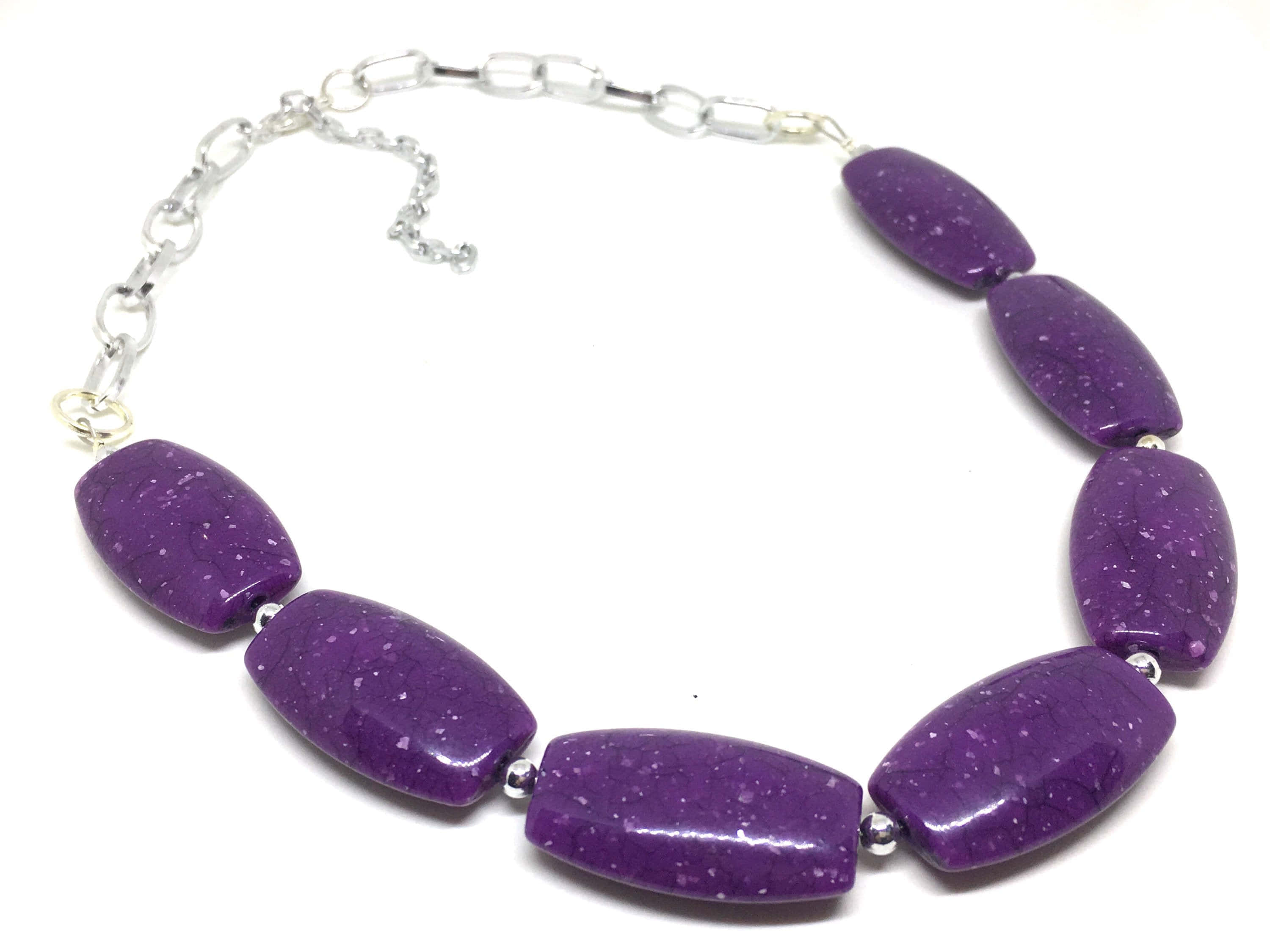 purple speckled bead necklace, silver chain links, clean white background, 2K Desktop Wallpaper