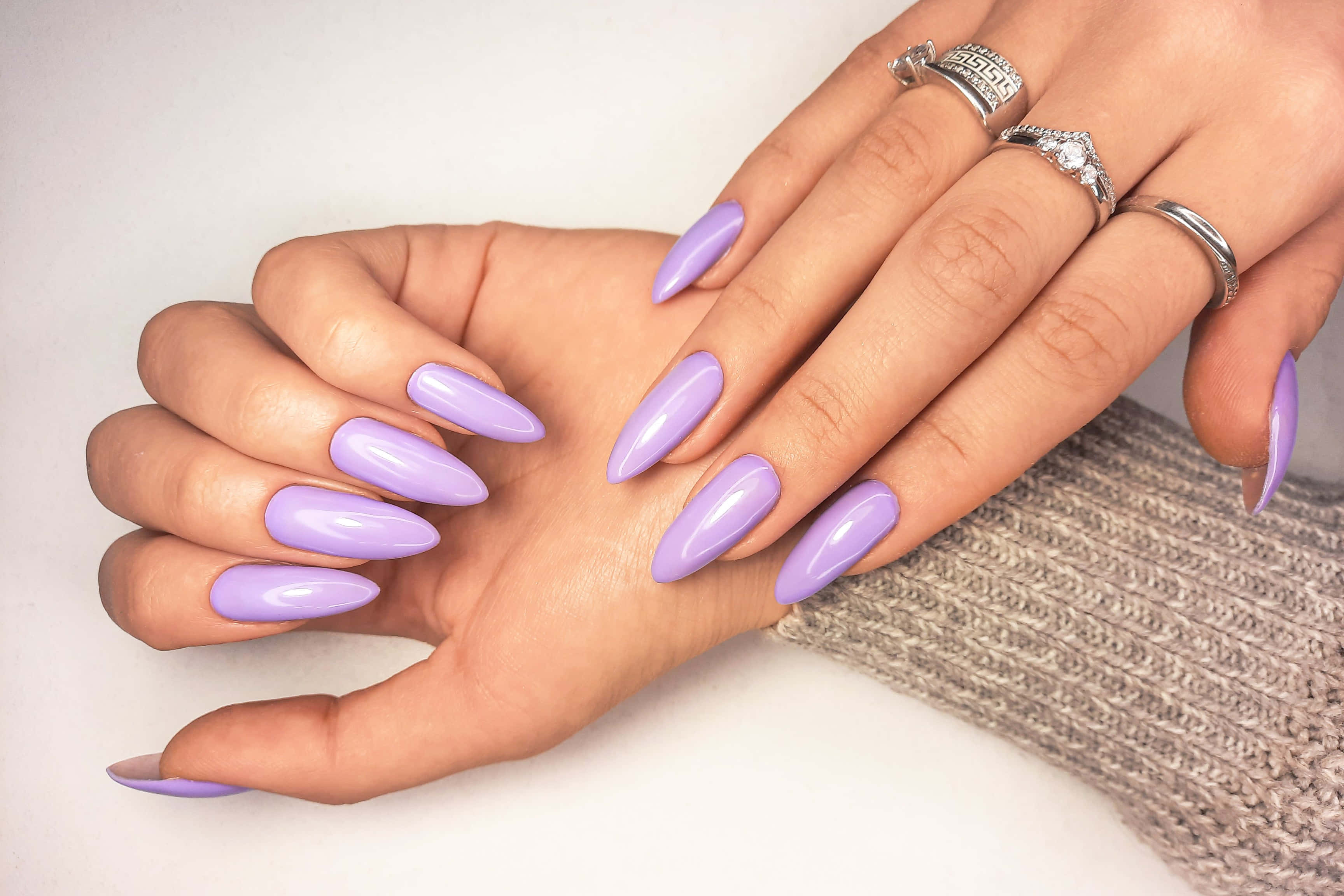 lavender stiletto nails, silver rings, beige knit sleeve, 2K Desktop Wallpaper