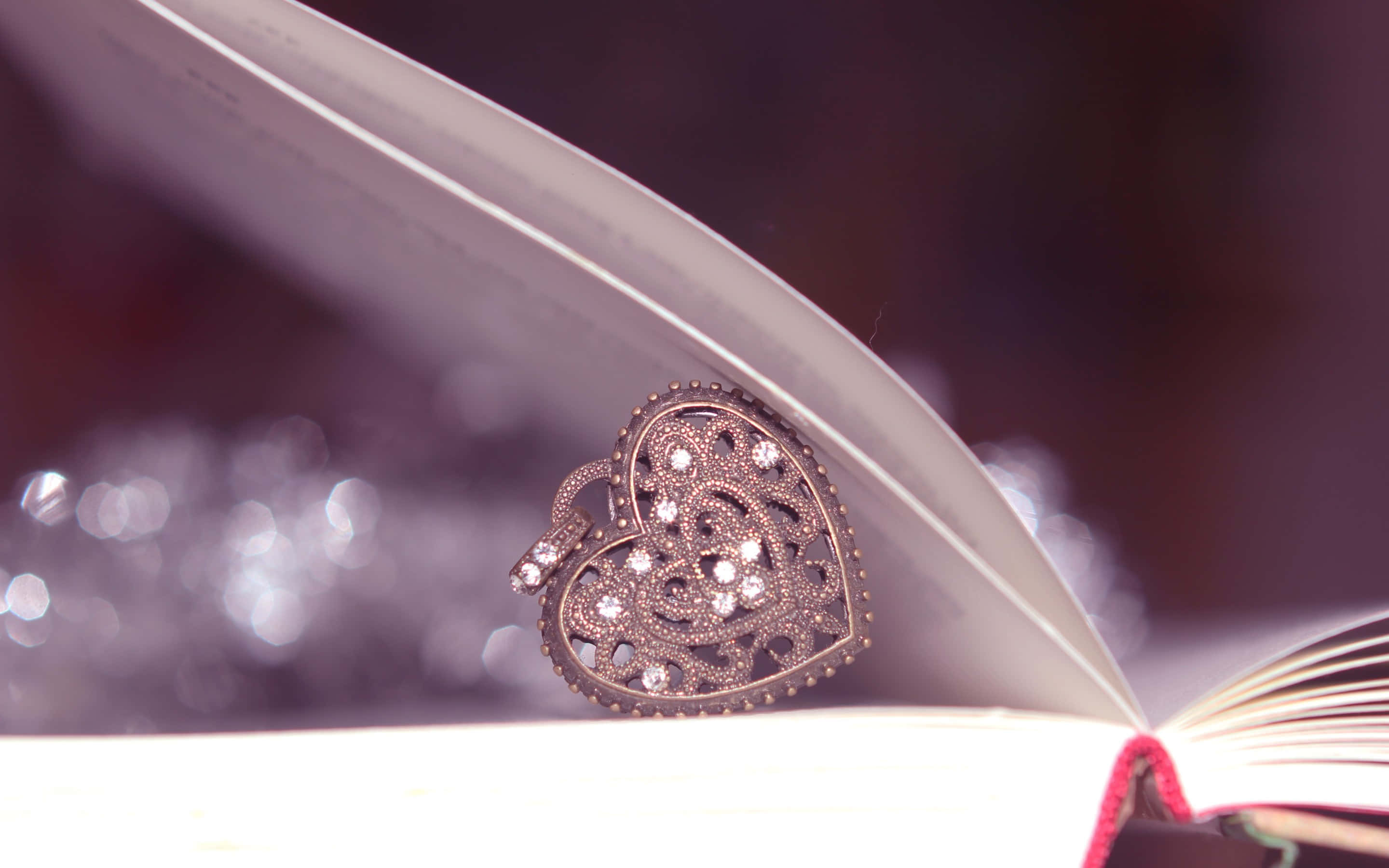 heart-shaped brooch, sparkling stones, book, 2K Desktop Wallpaper