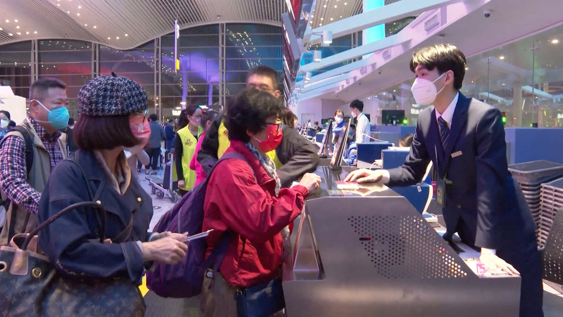 purple travel bag, modern airport check-in counter, bright lights, Full HD Desktop Wallpaper