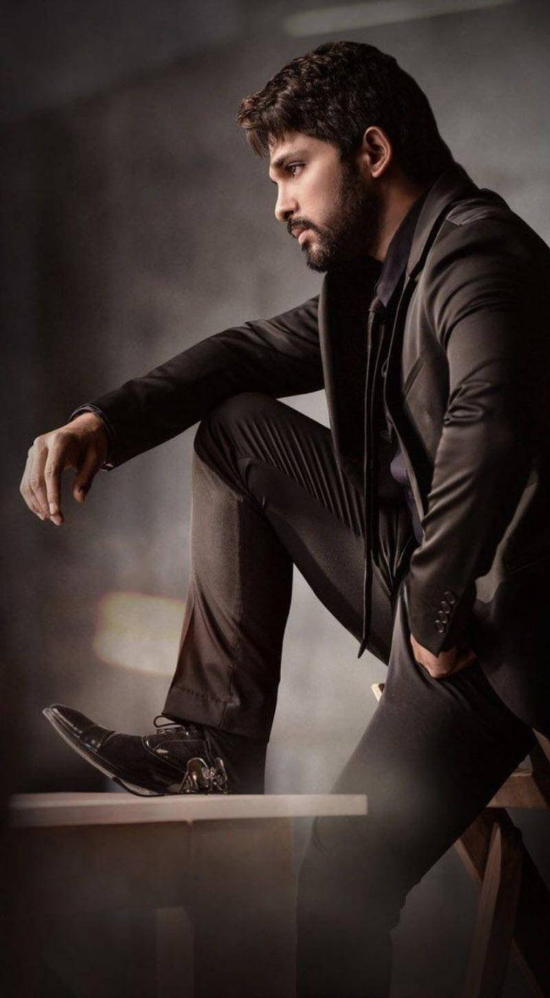 Pushpa Allu Arjun, dark suit, wooden stool, HD Phone Wallpaper