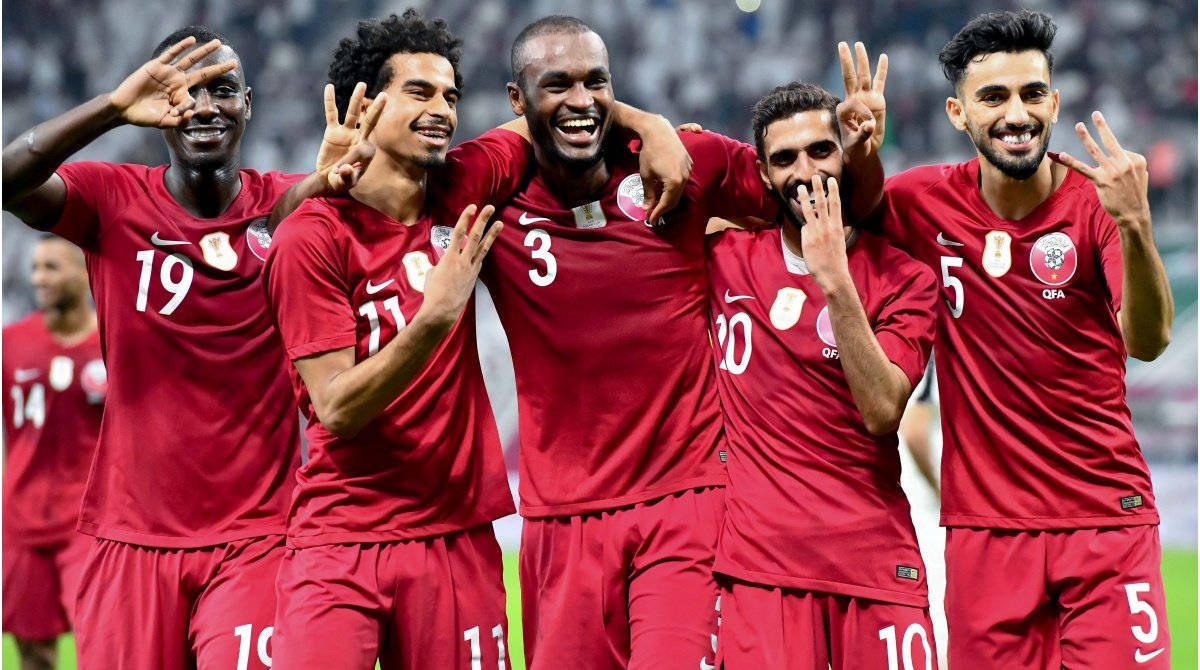 Qatar National Football Team, red jerseys, stadium field, SD Desktop Wallpaper