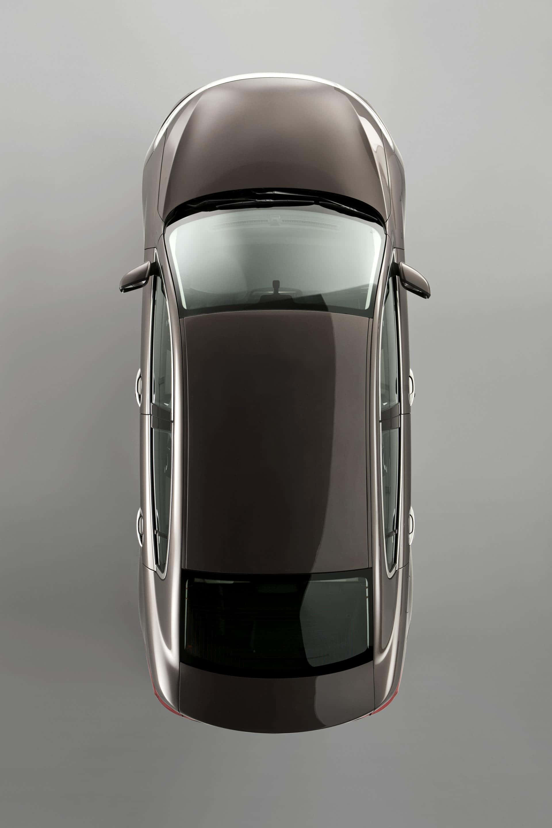 Qoros 3 Sedan, sleek metallic gray, chrome accents, 2K Phone Wallpaper