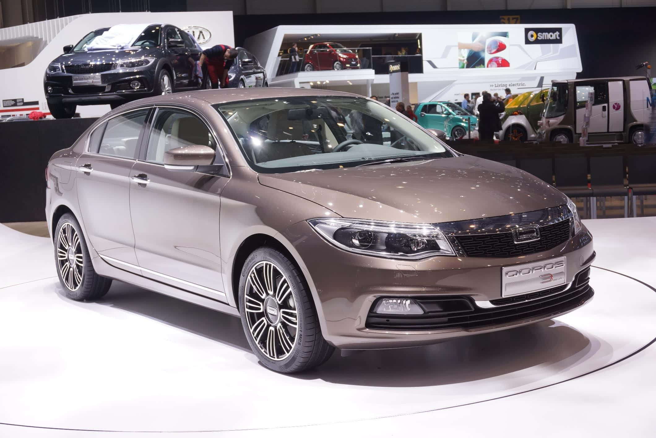Qoros 3 Sedan, bronze, white circular platform, Full HD Desktop Wallpaper