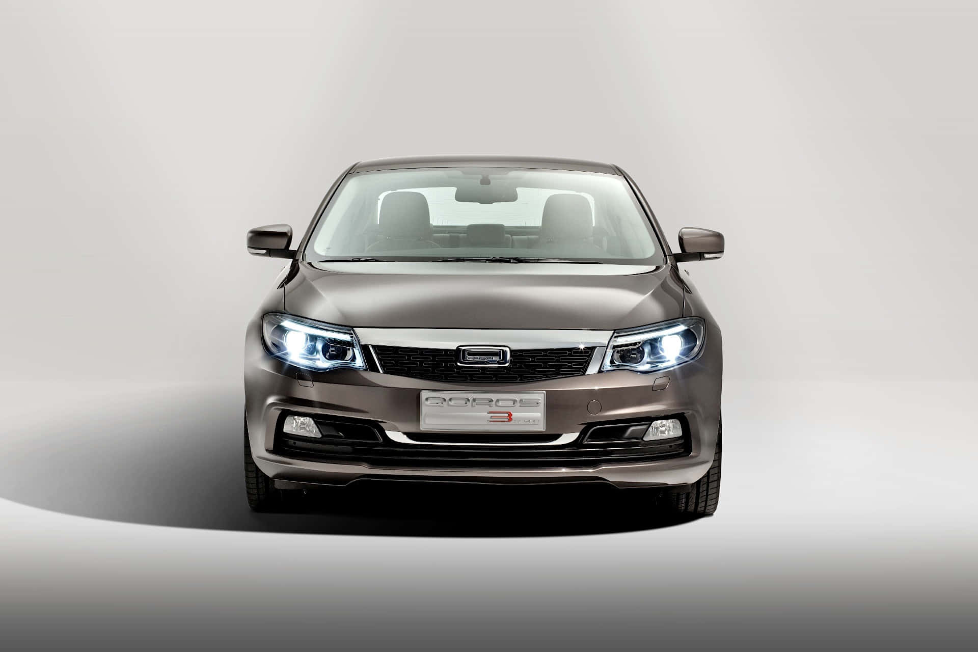 Qoros 3 Sedan, metallic brown, glowing headlights, Full HD Desktop Wallpaper