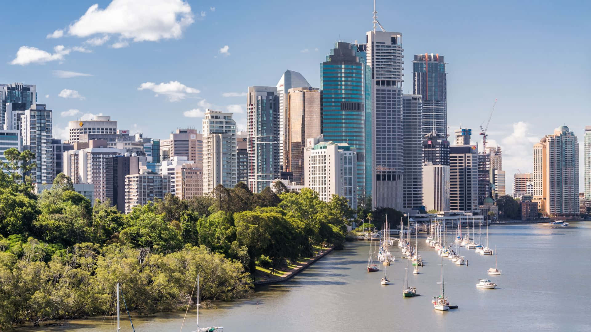 modern city skyline, glass skyscrapers, lush green trees, Full HD Desktop Wallpaper