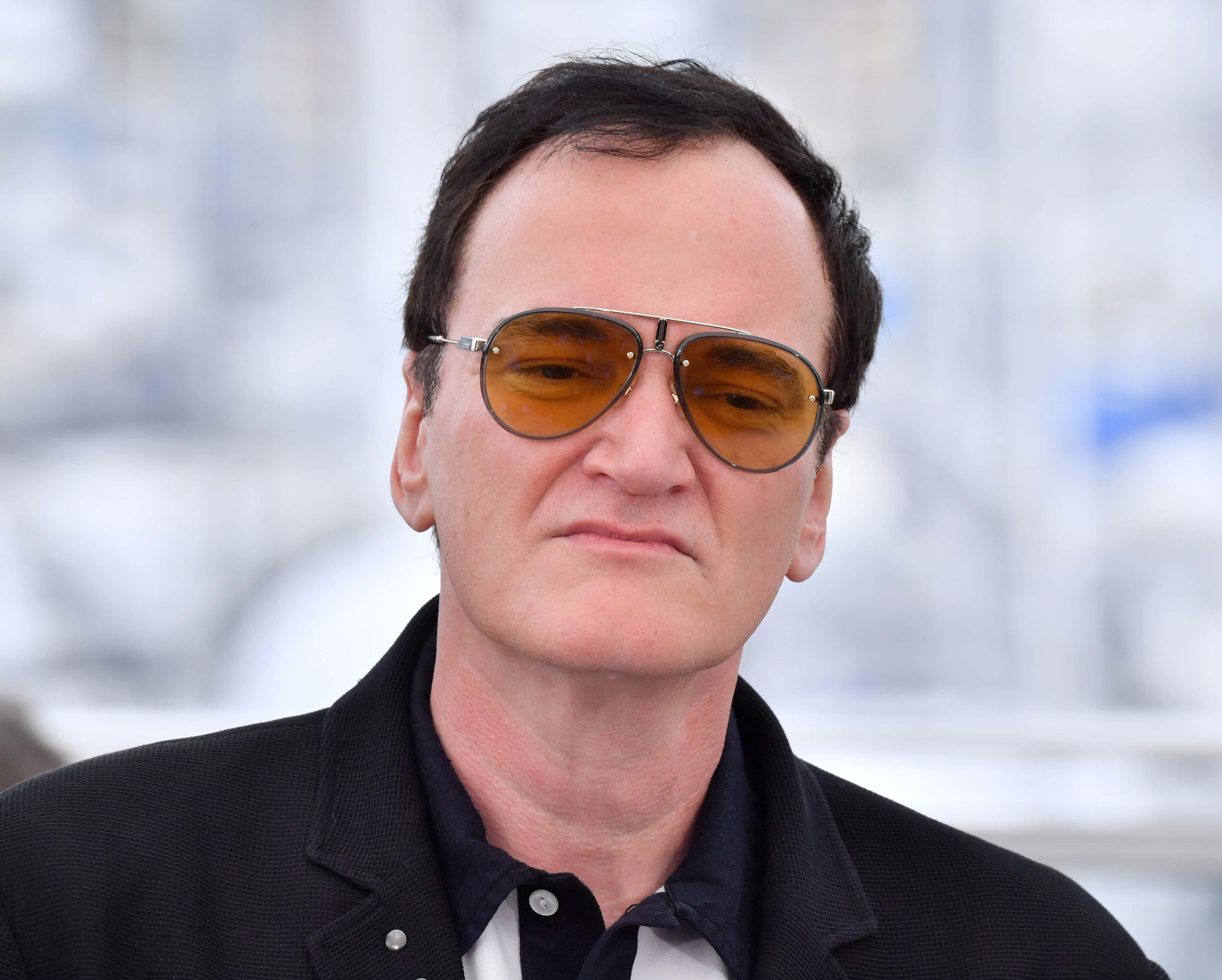Quentin Tarantino, amber-tinted aviator sunglasses, black jacket, 4K Desktop Wallpaper
