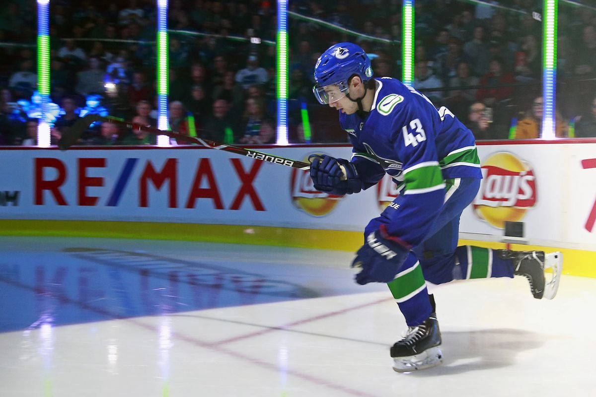 Quinn Hughes, blue and green uniform, ice, SD Desktop Wallpaper