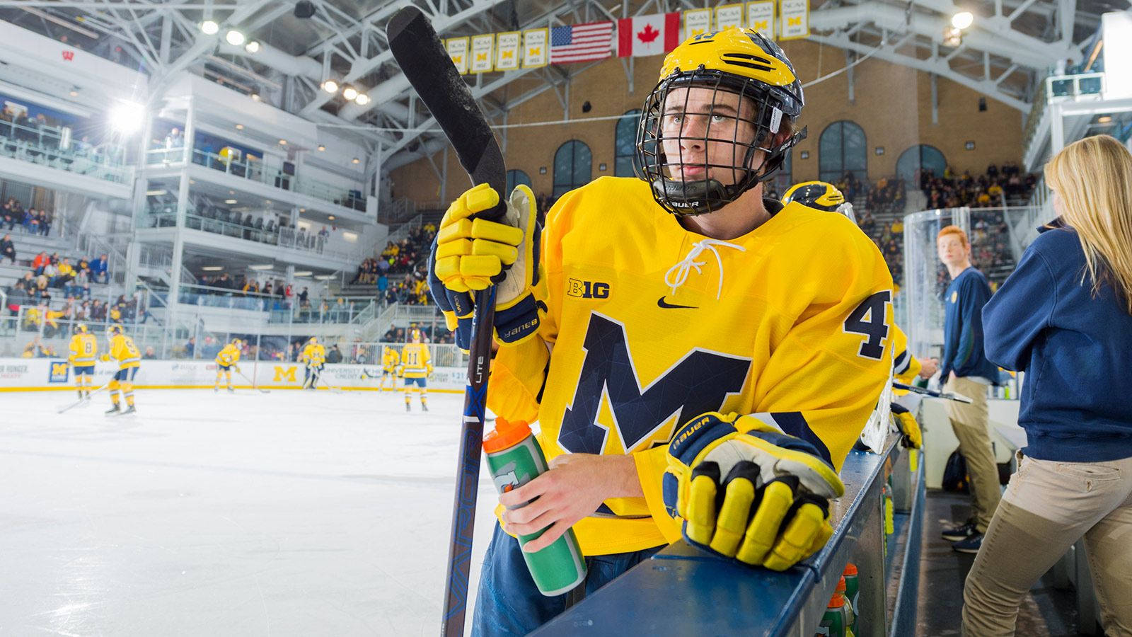 Quinn Hughes, yellow jersey, hockey stick, HD Desktop Wallpaper