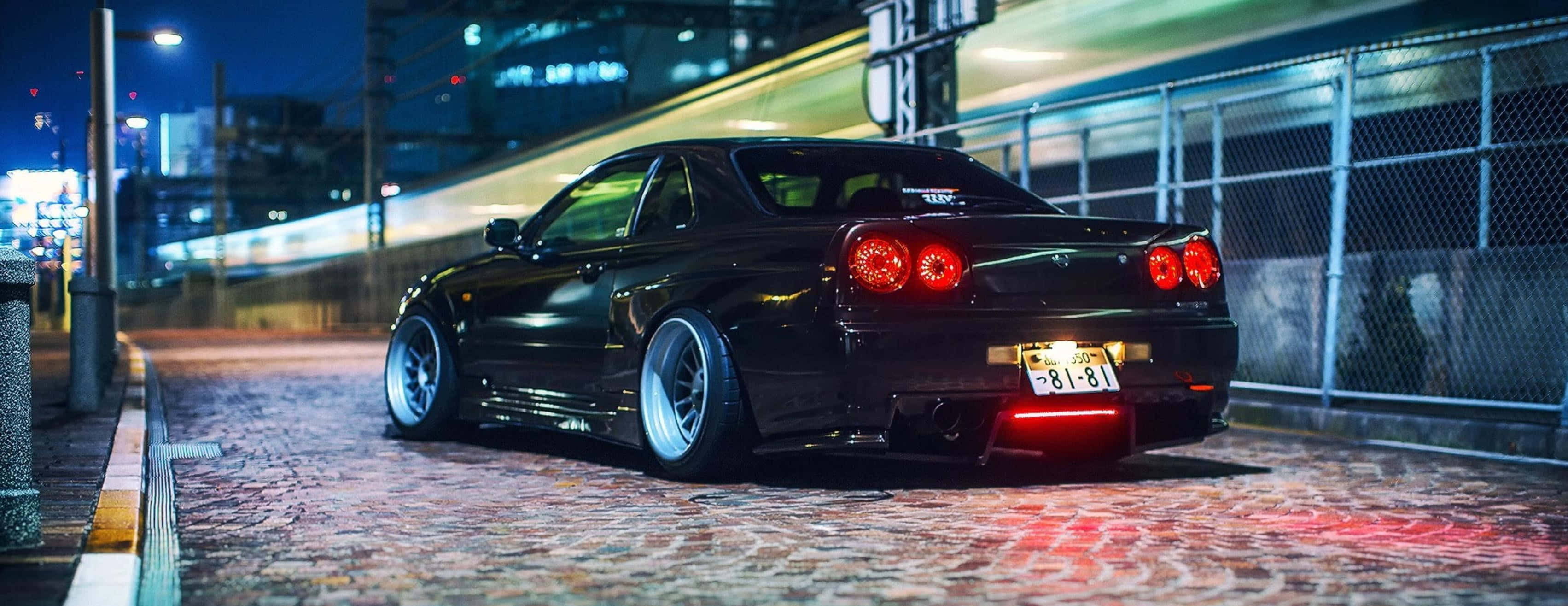 R33 GTR, black, glowing red taillights, 2K Desktop Wallpaper