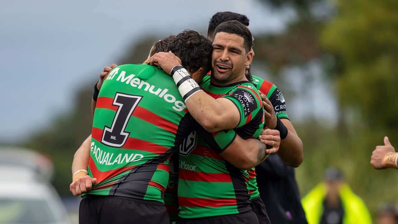 Rabbitohs, green and red striped jerseys, grassy field, HD Desktop Wallpaper