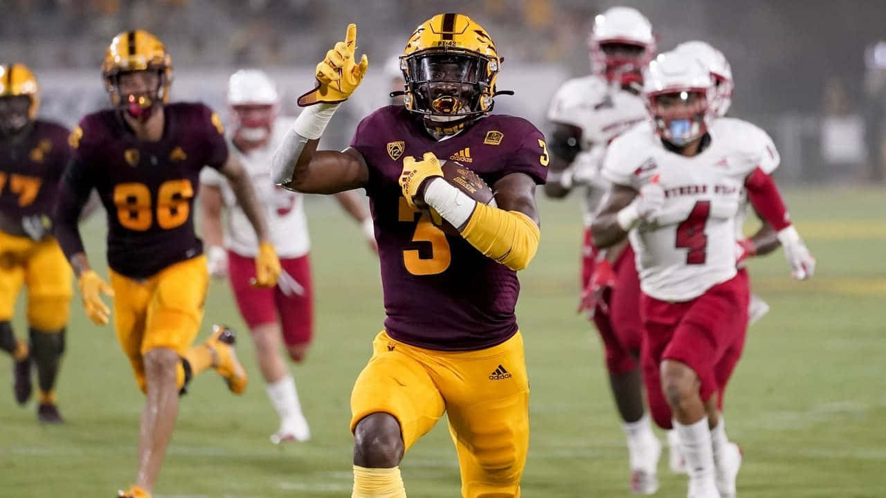 Rachaad White, maroon and gold uniform, lit field, HD Desktop Wallpaper