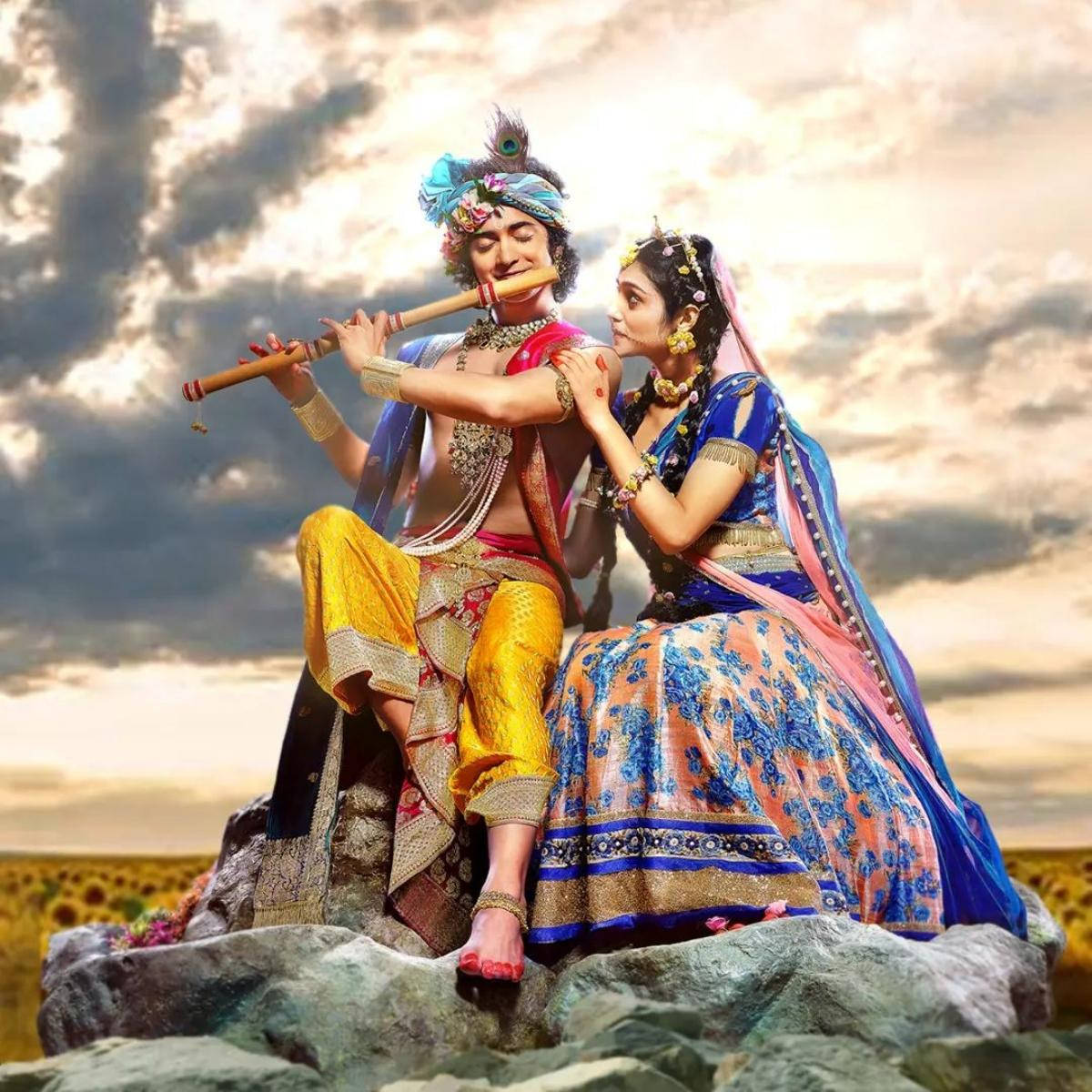 Radha Krishna, bamboo flute, vibrant yellow and blue traditional attire, SD Desktop Wallpaper