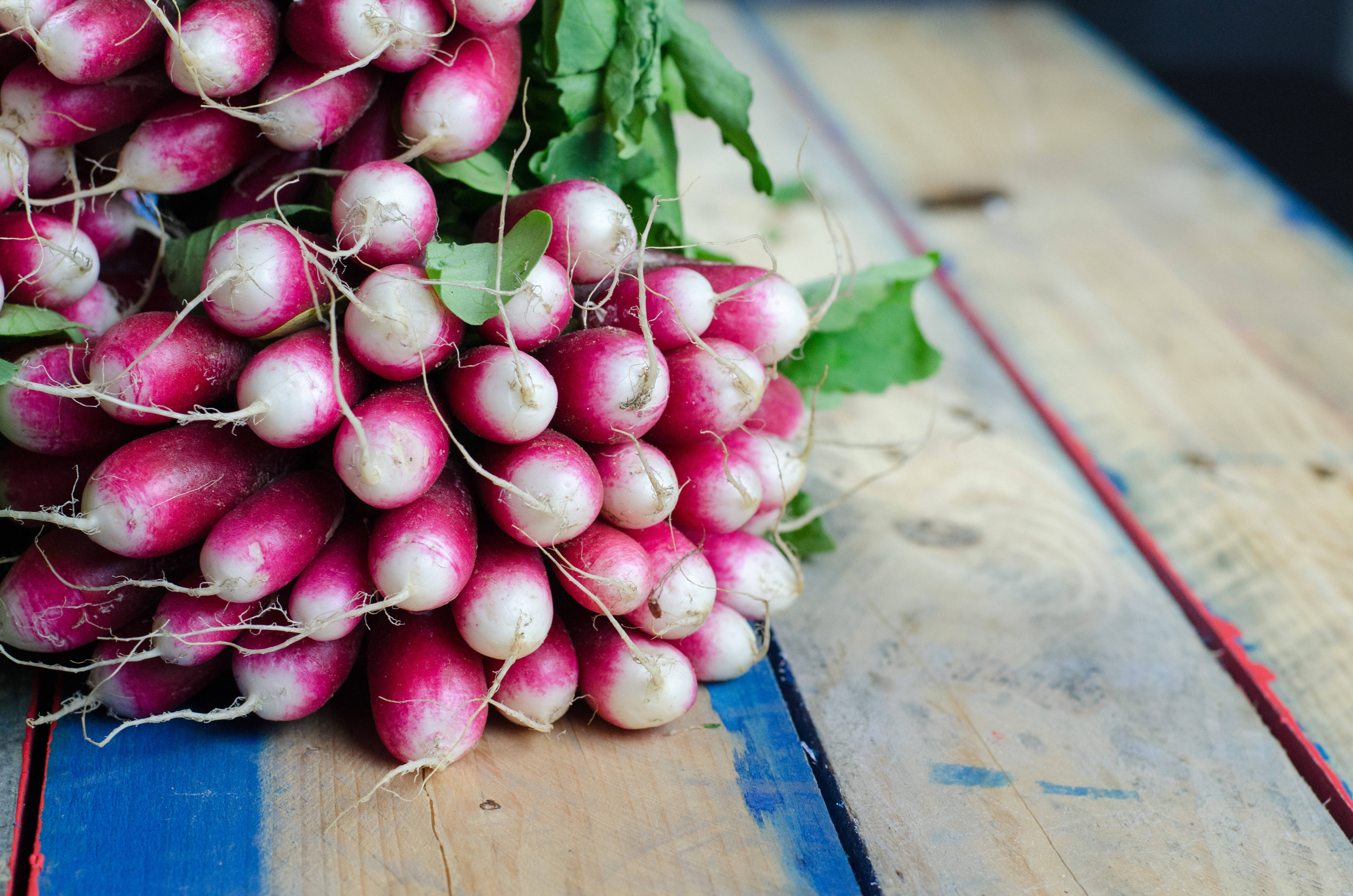 long root radish, green tops, weathered wooden surface, 4K Desktop Wallpaper