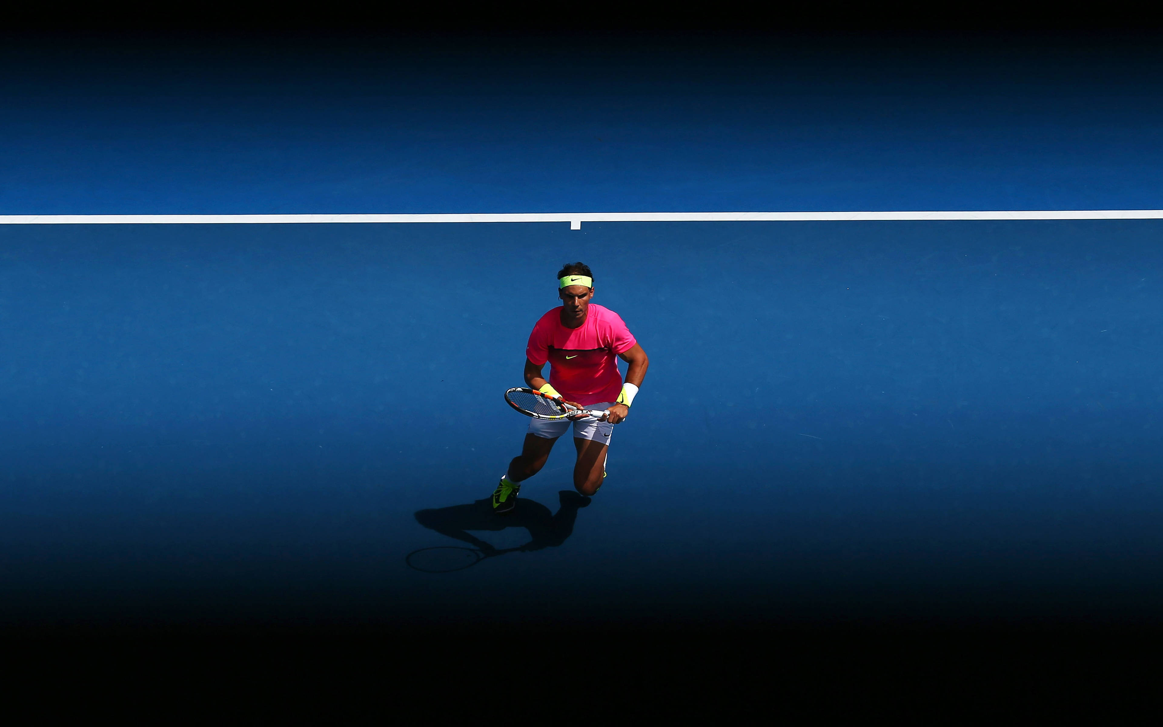Rafael Nadal, bright pink shirt, deep blue court, 4K Desktop Wallpaper