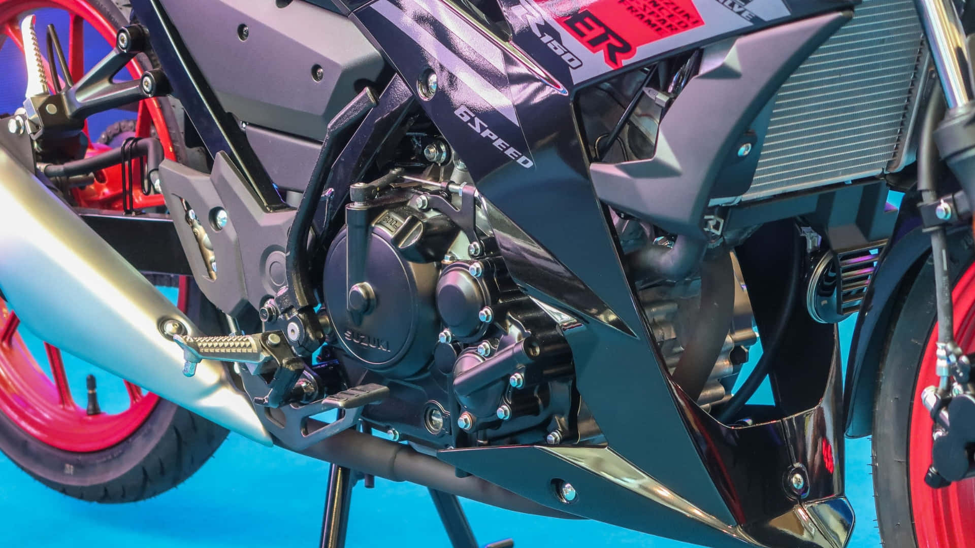 Raider 150 Fi, black and red motorcycle engine, chrome accents, Full HD Desktop Wallpaper