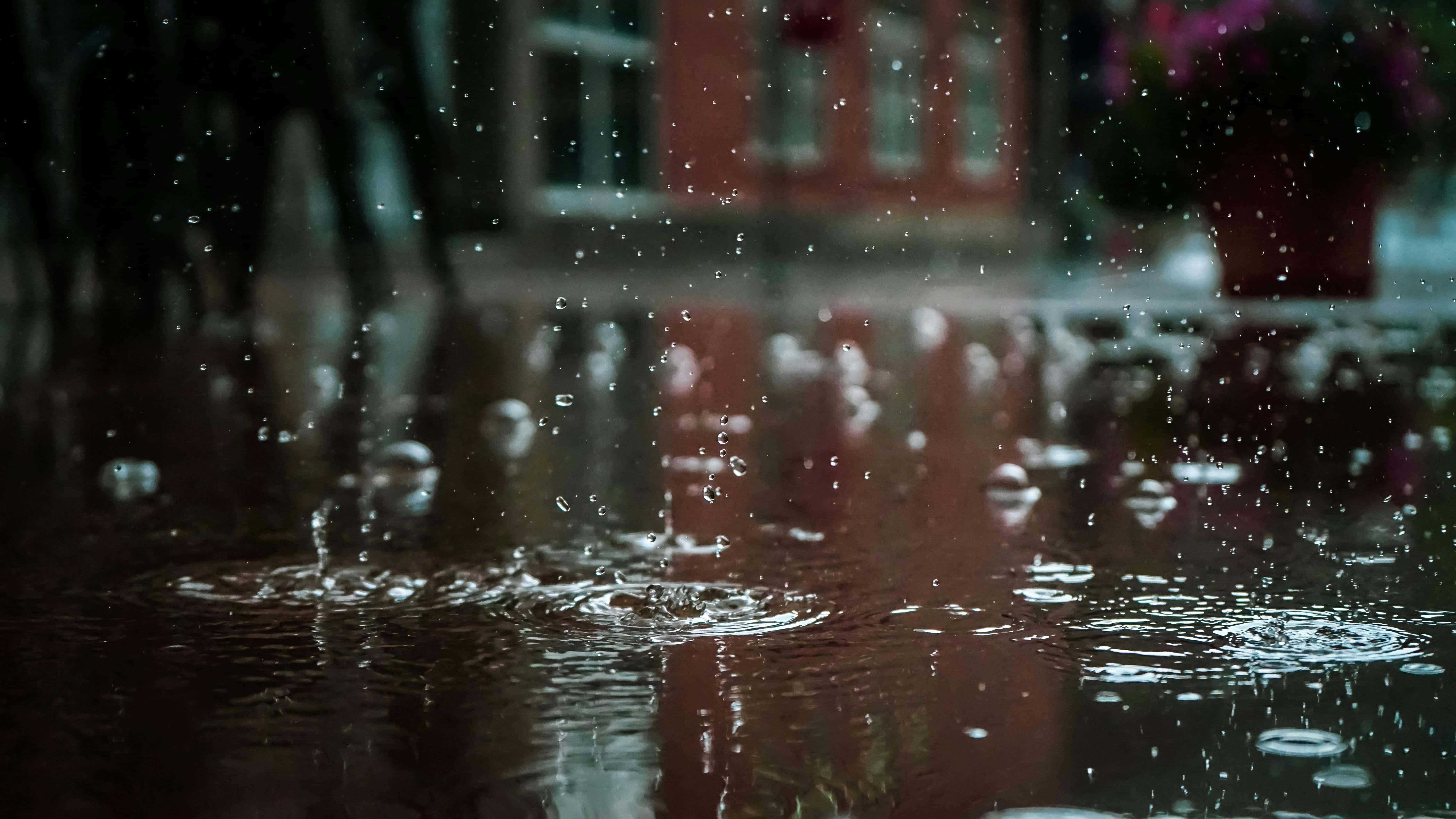 rainy puddle, wet pavement, red buildings, 5K Desktop Wallpaper