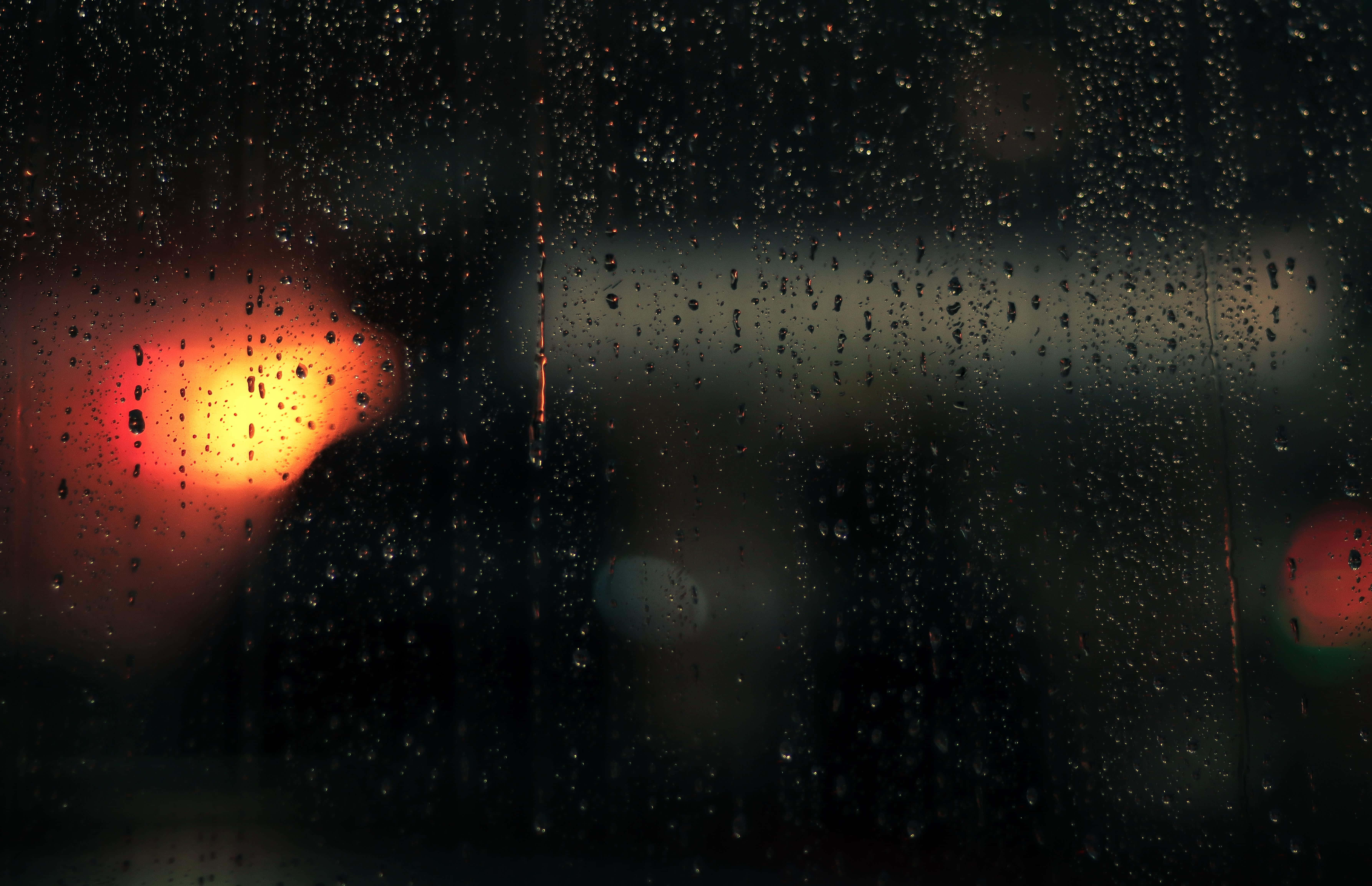 Raindrops, dark window, blurred orange and red lights, 5K Desktop Wallpaper