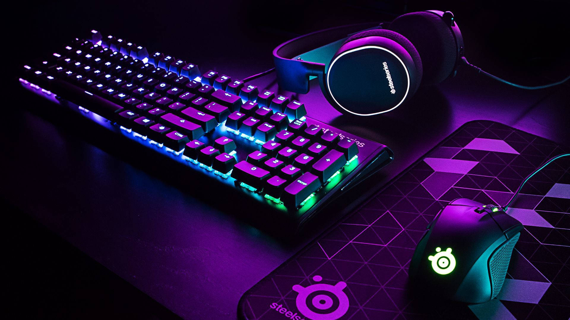 Purple Gaming PC Set-up, glowing keyboard, glowing mouse, Full HD Desktop Wallpaper