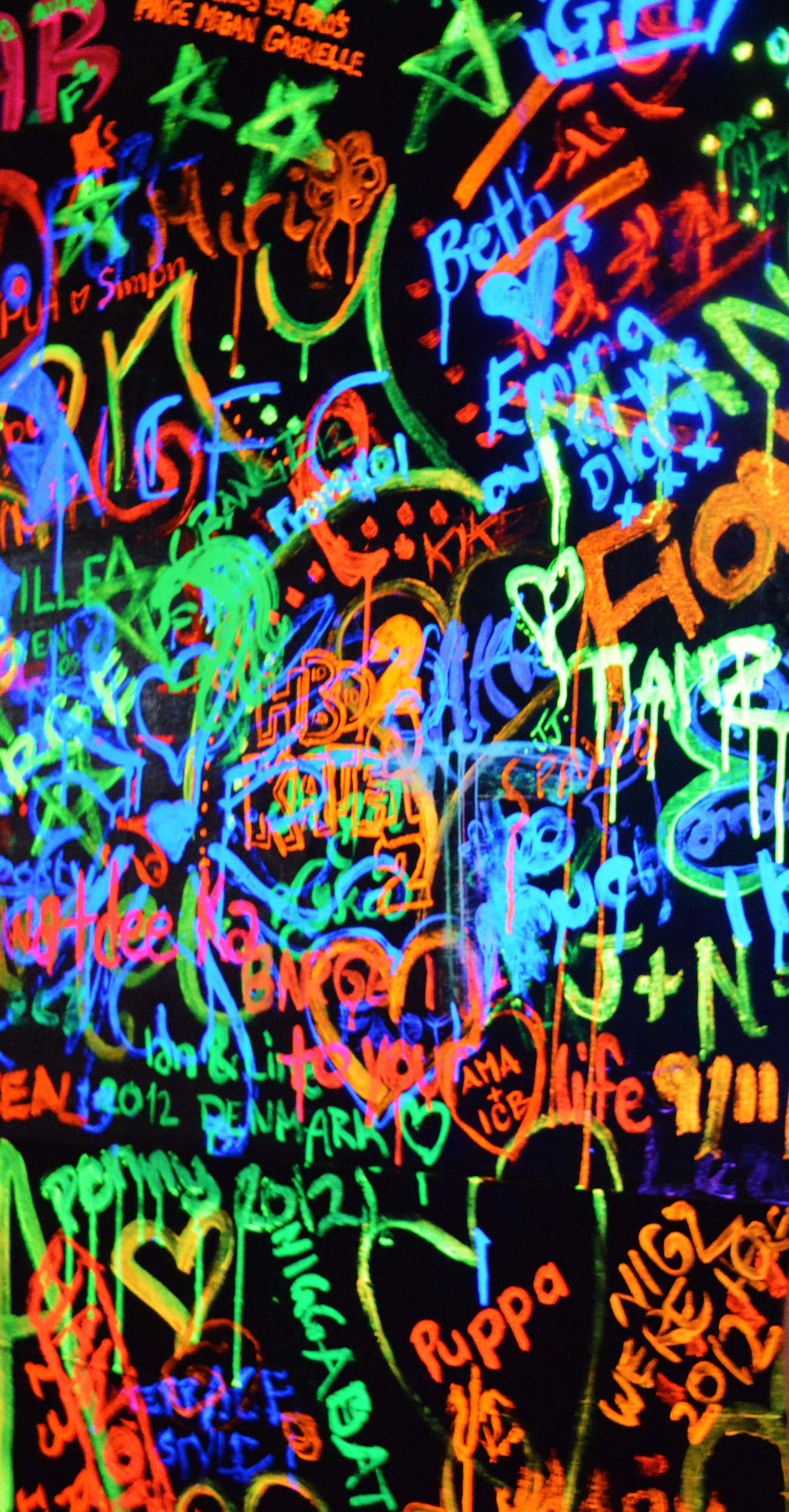 Vibrant U V Graffiti Artwork, neon graffiti, dark wall, 4K Phone Wallpaper