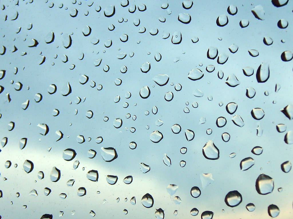 glass surface, soft blue sky, subtle cloud shadows, SD Desktop Wallpaper