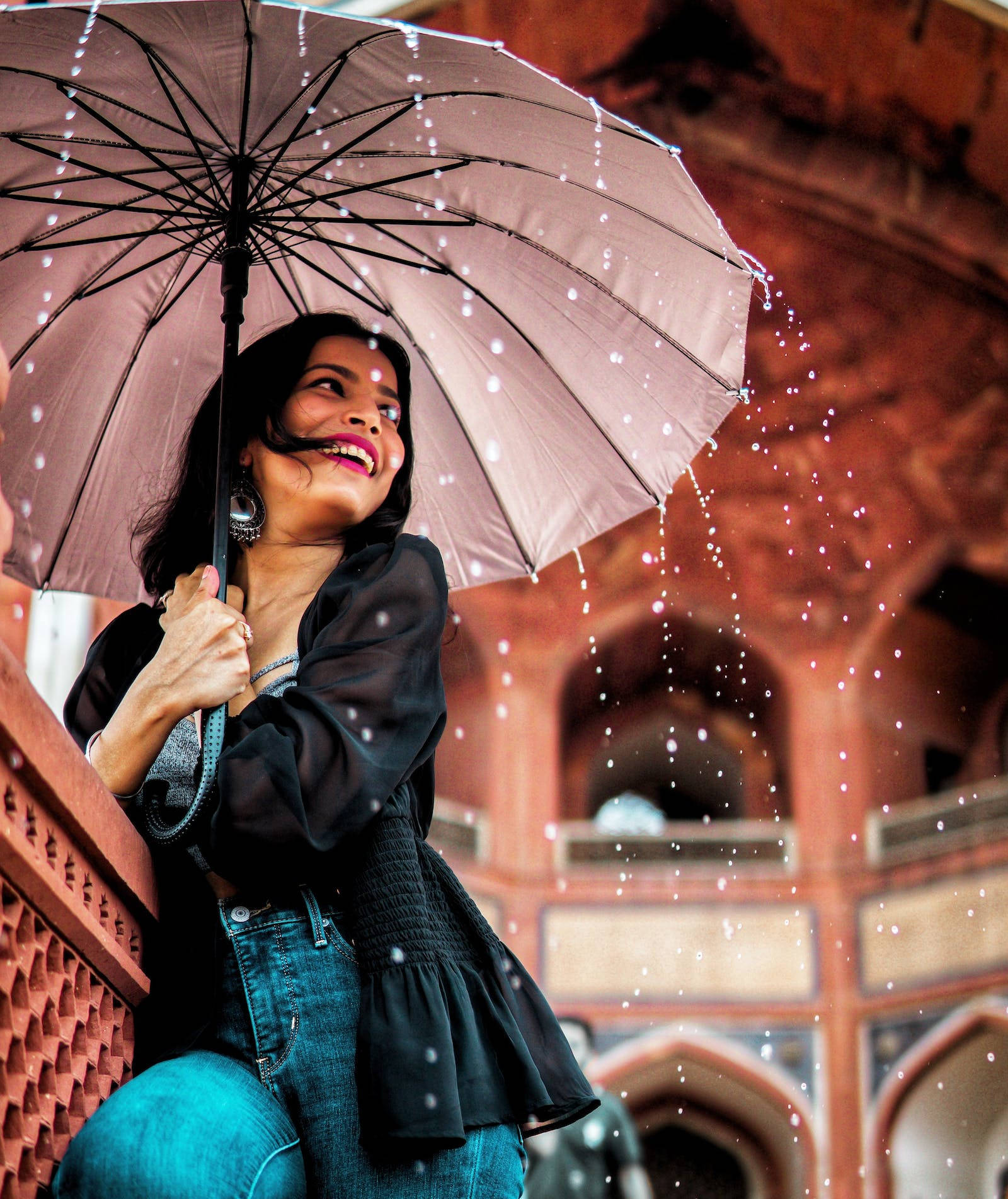 translucent umbrella, warm red stone arches, raindrops, HD Phone Wallpaper