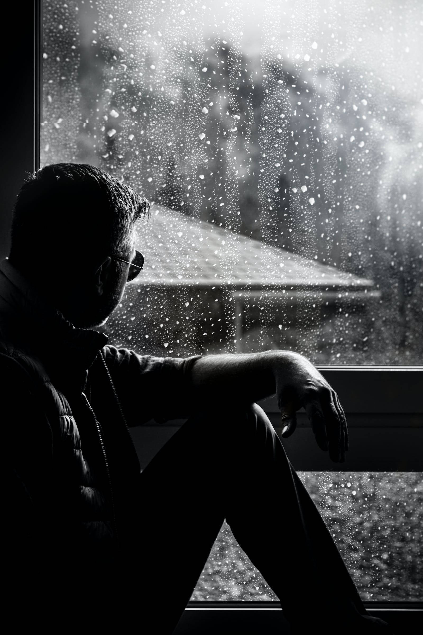silhouette, rain-speckled window, blurred snowy landscape, Full HD Phone Wallpaper